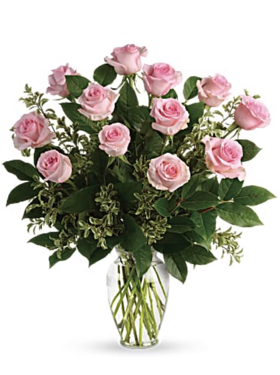 Pink roses arranged in a clear glass vase