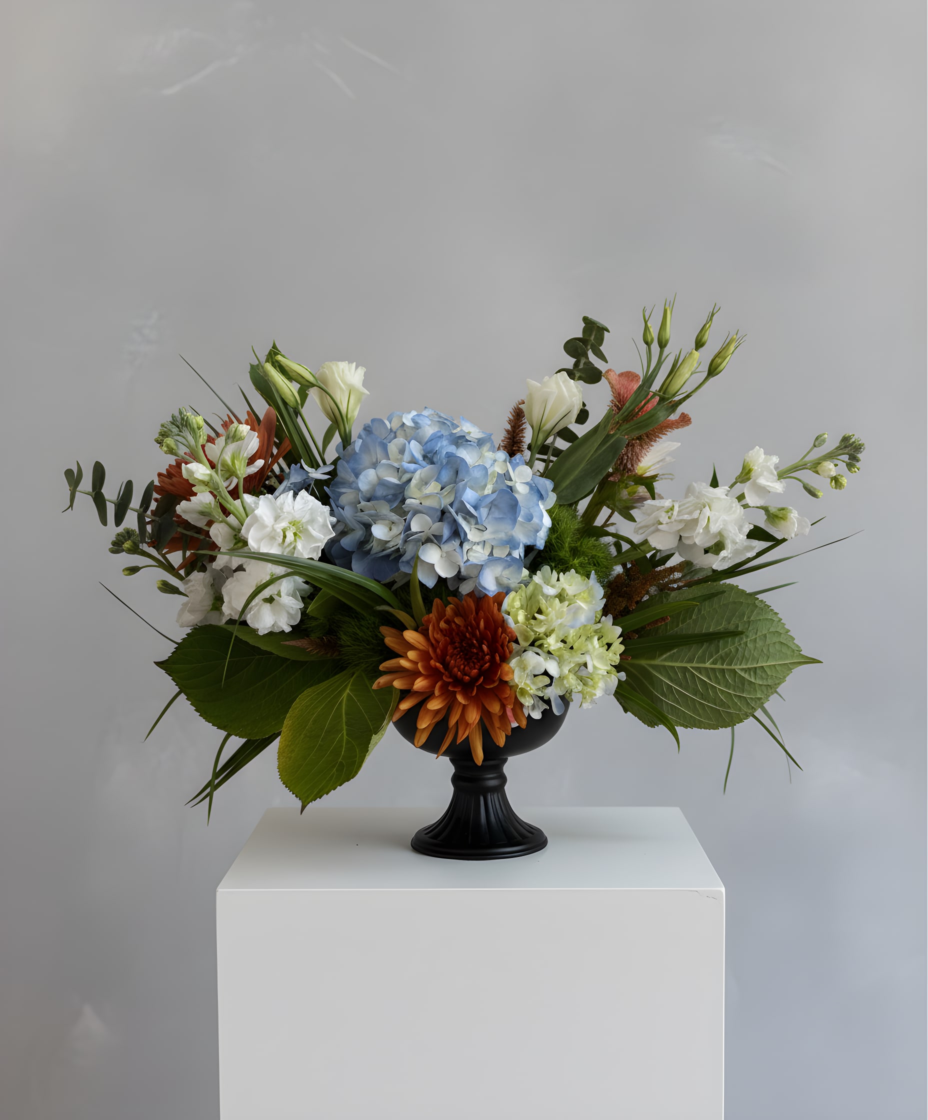 Spring Smooch - Because flowers follow the rhythm of the seasons, availability changes often. Your arrangement may vary from the photo, and some varieties may differ. We design with the freshest blooms available, making substitutions when needed—while always preserving the overall mood: fresh, artful, and beautifully composed.  For specific flower or color requests, please contact us before ordering.