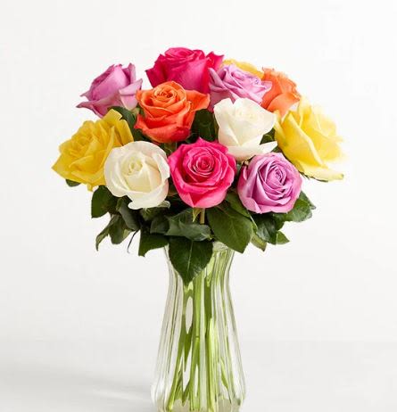 Dozen Assorted Roses -  Pet Friendly? Yes Roses are non-toxic to cats and dogs according to the ASPCA. However, please use caution with the thorns, which can cause minor scratches or mouth irritation if chewed. Keep out of reach of curious pets to prevent the vase from tipping.   Human Allergy Note No major allergy-triggering flowers noted. Roses have heavy pollen that typically does not become airborne, though highly sensitive individuals may react to the natural fragrance.   Care &amp; Longevity To keep your roses vibrant, trim the stems at a 45-degree angle every two days and place them in a clean vase with fresh, room-temperature water. Ensure no leaves are submerged below the waterline to prevent bacterial growth. Keep the arrangement away from direct sunlight, heating vents, and ripening fruit to extend its vase life.   Best Occasions &amp; Situations  Romance/anniversary  Birthday  Congratulations flower  Mother's Day  Just because  Thinking of you  Wedding's  Retirement flower  Why Customers Love It Vibrant color variety that suits almost any personality. Premium long stems for a tall, elegant silhouette. Arrives gift-ready in a reusable glass vase. Versatile design appropriate for both professional and personal gifts. Freshness guaranteed through local professional handling.