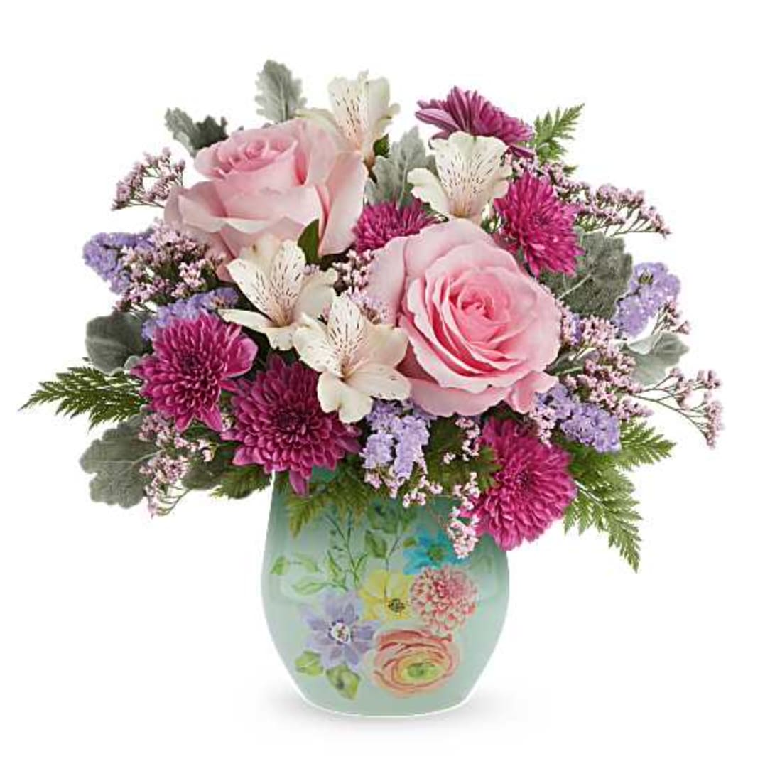 Dream in Bloom Bouquet - Make Mom smile with our Dream in Bloom Bouquet, a lovely blend of pink and lavender blooms beautifully arranged in our Watercolor Garden Vase. This heartfelt Mother's Day surprise brings soft spring color and a keepsake she'll enjoy. The Dream in Bloom Bouquet is a beautiful Mother's Day floral arrangement featuring pink roses, ivory alstroemeria, purple cushion spray chrysanthemums, lavender sinuata statice, and pink limonium, accented with dusty miller and leatherleaf fern, delivered in our Watercolor Garden Vase. Orientation: All-Around