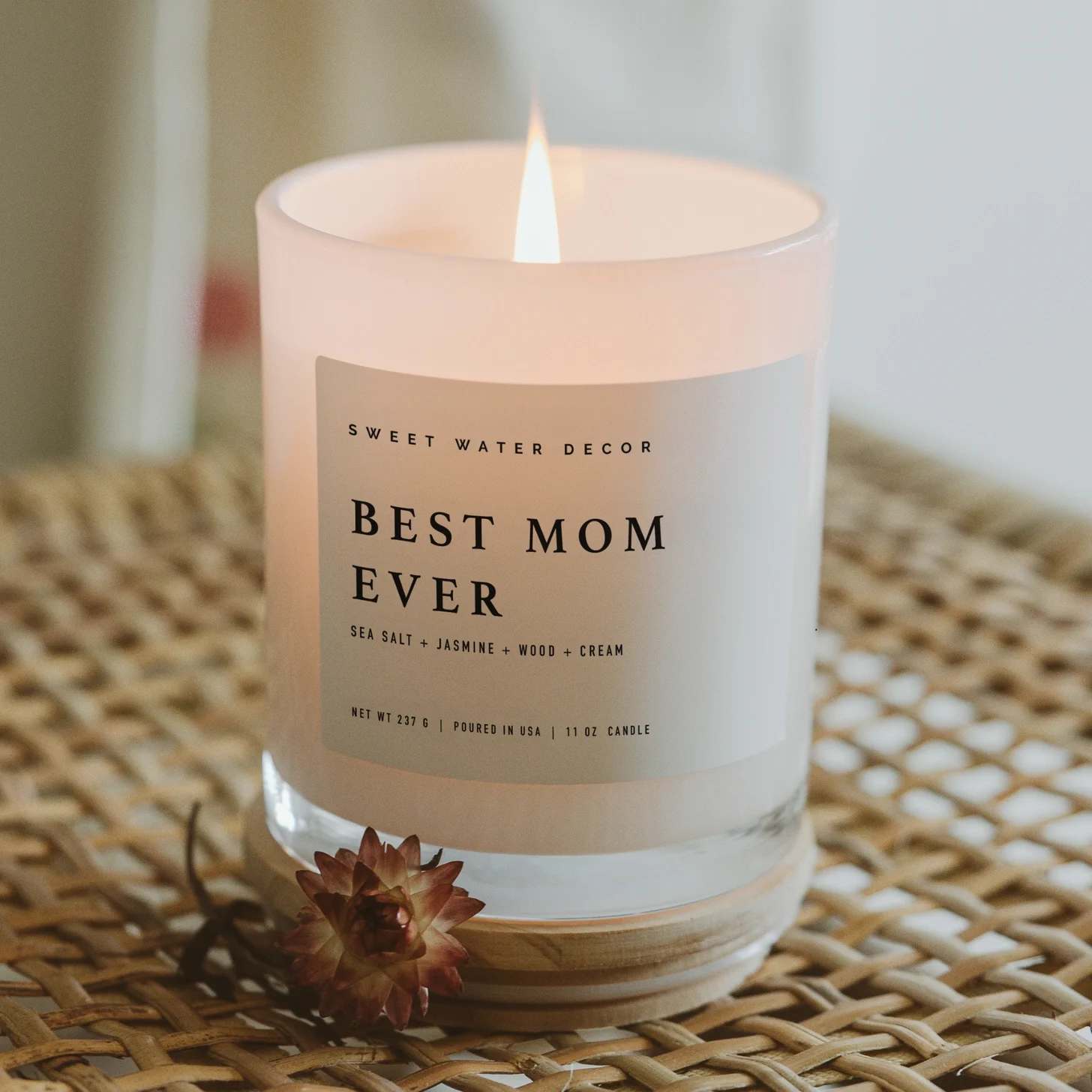 Best Mom Ever! 11 oz Soy Candle - Celebrate Mother's Day, Valentine's Day, and more with a gift for mom. Our relaxing Spa Day scent offers the relaxation she needs, and our white jar seamlessly goes with any space. Great for baby showers, baby announcement, and more!  SCENT NOTES: • Top: Sea Salt, Jasmine • Middle: Wood • Base: Cream  CANDLE INFO: • Size: Volume 11oz | 214g Net Weight | 3x3x3.5" • Burn Time: 50+ Hours • Wick: 100% Cotton (Lead and Zinc Free) • Wax: Proprietary Soy Based Wax Blend | Vegan, Non-GMO, Kosher Premium Fragrance Oil • Gluten Free, Phthalate Free, Non-Toxic • Made in Pittsburgh, PA