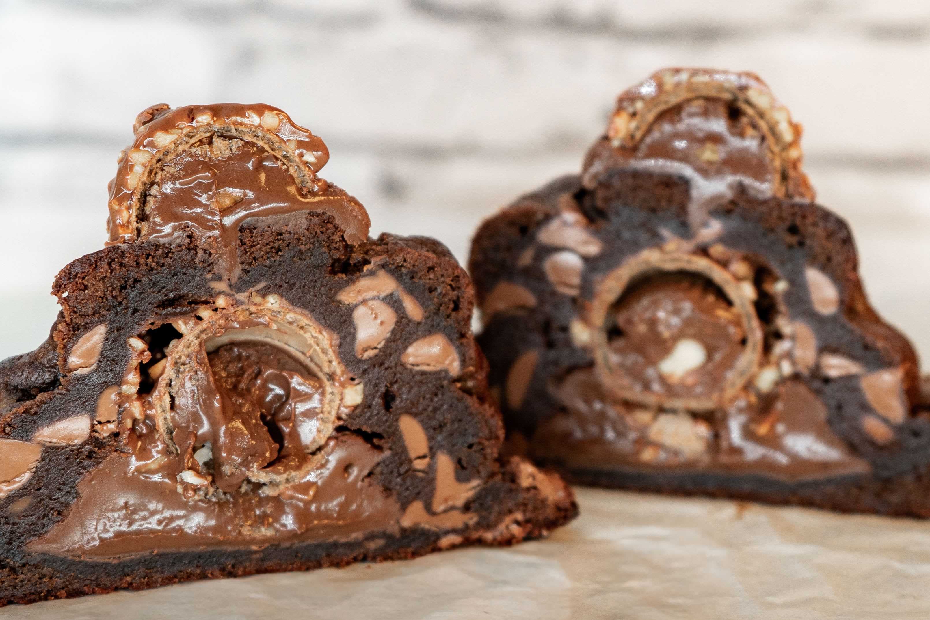 Ferrero Chocolate Lava Cookie (NY Style) - Treat someone special to the ultimate sweet indulgence. Our Ferrero Chocolate Lava Cookie is a luxurious New York-style cookie, baked to perfection with a crisp outer layer and a rich, gooey center. Each cookie is generously stuffed with creamy chocolate and a whole Ferrero-style center, creating a decadent melt-in-your-mouth experience in every bite. It’s the perfect complement to any floral arrangement—adding a touch of sweetness, elegance, and surprise.  Perfect for: Mother’s Day gifts Birthdays Romantic surprises Corporate gifting Or simply to elevate any floral order  Product Details: Sold individually (1 cookie per order) Premium NY-style oversized cookie Soft, gooey center with Ferrero chocolate filling Made fresh to order  Add it to your flowers: Make your gift unforgettable by pairing this gourmet cookie with one of our floral arrangements.