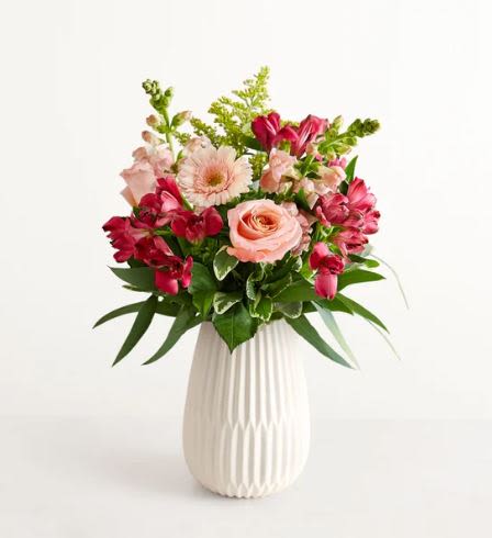 Blush Expressions Flower  -  Pet Friendly? No This bouquet contains Eucalyptus and Gerbera Daisies, which can cause digestive upset or more serious irritation in household pets. Keep out of reach; avoid homes with curious cats or dogs .   Human Allergy Note This arrangement contains Gerbera Daisies and Solidago, which are known for carrying higher pollen loads. To minimize irritation, keep the bouquet away from bedding and ensure the room is well-ventilated.   Care &amp; Longevity To keep your blooms fresh, trim the stems at a 45-degree angle upon arrival and place them in a clean vase with fresh water. Change the water every two days, avoid direct sun or heat vents, and remove any fading blooms to prevent bacteria growth.   Best Occasions &amp; Situations  Bright birthday surprise  Romantic anniversary gift  Get well soon gesture  Office promotion celebration  New baby arrival  Housewarming present  Why Customers Love It Soft color balance that fits almost any home decor. Tall, elegant shape that makes a grand visual impact. Comes in a reusable, high-quality textured ceramic vase. Versatile enough for both celebratory and comforting occasions.