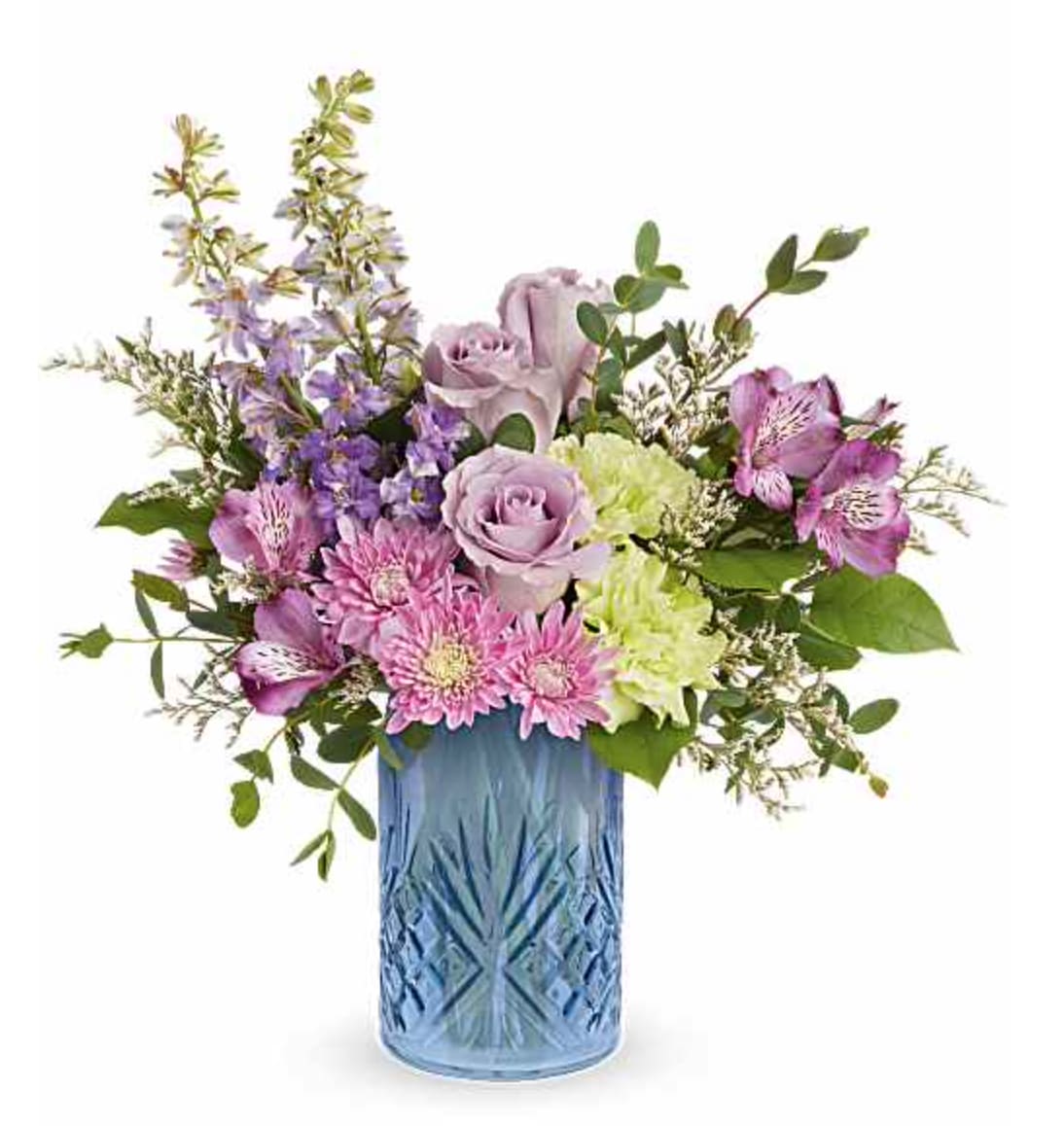 Garden Whimsy Bouquet - Surprise Mom with our Garden Whimsy Bouquet, a soft blend of lavender and pink blooms beautifully arranged in the Blue Belle Vase. This elegant Mother's Day gift adds fresh spring charm and lasting beauty to any space. Our Garden Whimsy Bouquet is a charming Mother's Day flower arrangement featuring lavender roses, purple alstroemeria, green carnations, lavender larkspur, lavender cushion spray chrysanthemums, and white limonium, accented with lemon leaf and parvifolia eucalyptus, delivered in Teleflora's Blue Belle Vase. Orientation: All-Around  SUBSTITUTION POLICY – Always deliver the freshest flowers! Please note the bouquet pictured reflects our original design.  If the exact flowers or container in this arrangement are not available, our local florists will create a beautiful bouquet with the freshest available flowers.