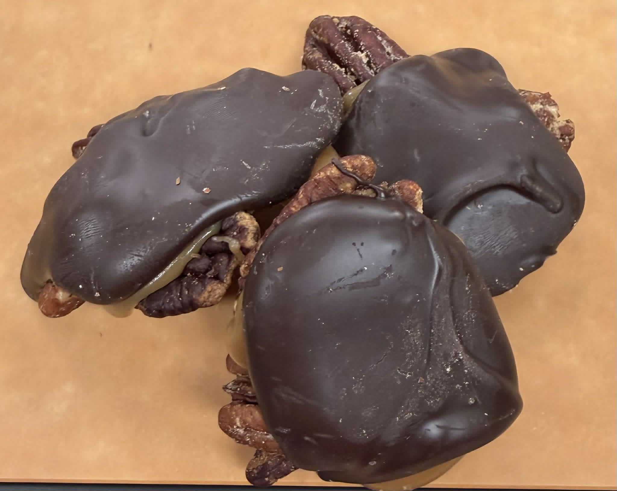 Dark Chocolate Turtles - Homemade from scratch with our Roasted Pecans and Caramel.  Prepared in our Licensed kitchen.