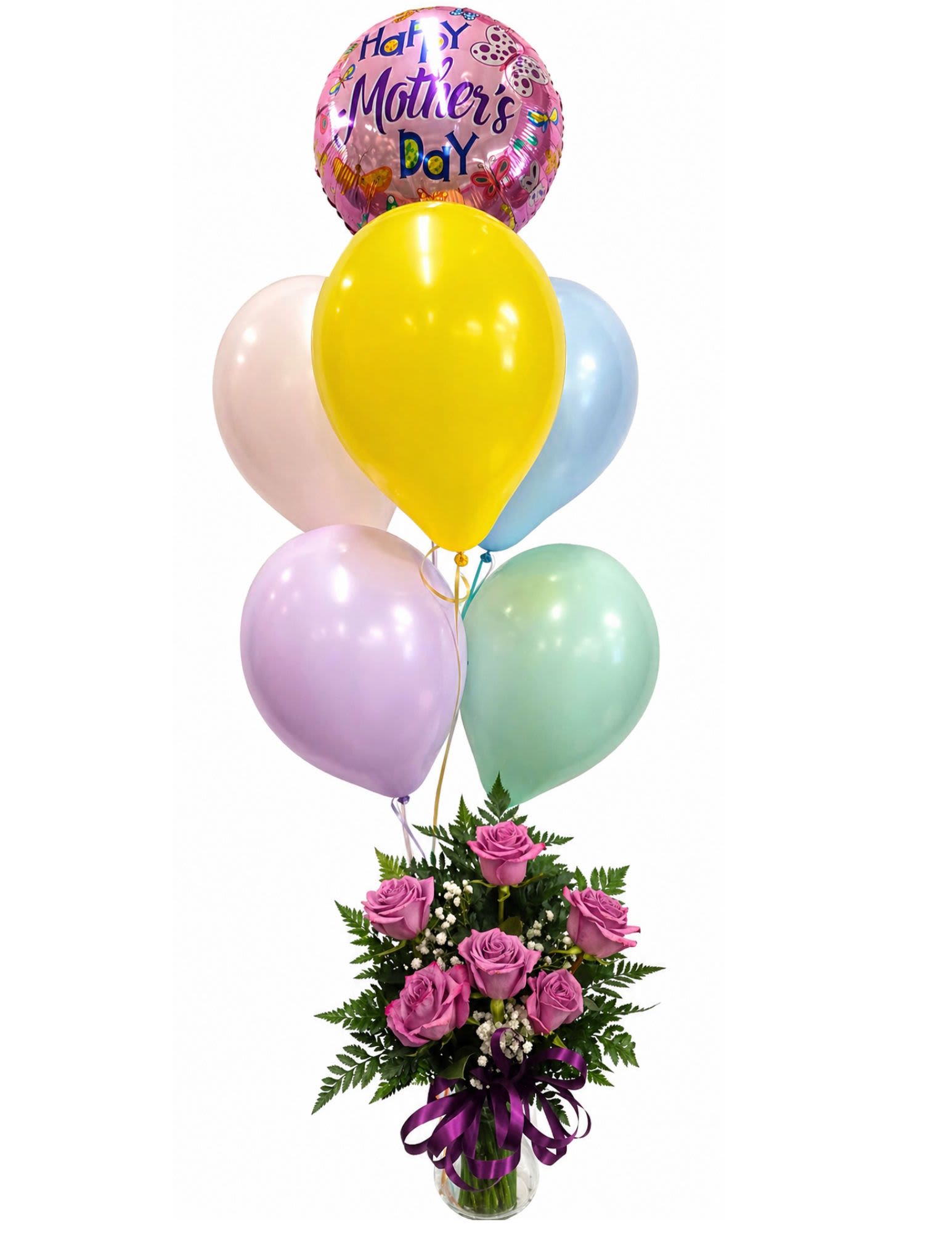 Mothers Day Special #1  - A half dozen roses tucked into a clear glass vase pair with a cheerful cluster of pastel latex balloons and a shiny "Mother's Day" foil balloon to create a playful Mother's Day flower arrangement that feels like a small celebration on the table. This Mother's Day arrangement is perfect for honoring Mom, grandma, or any mother figure - it sends a bright, joyful message that she's loved and celebrated.  The design features a compact bouquet of soft lavender-pink roses set low in a clear glass vase, accented with fern-like foliage and finished with a purple ribbon. Above the roses float round latex balloons in yellow, blue, pink, lavender, and mint tones plus a festive foil balloon, giving a lively vertical pop of color. Ideal for breakfast in bed, a kitchen centerpiece, or a cheerful delivery to brighten her day, the arrangement arrives ready to display; keep the roses in fresh water and the balloons away from sharp edges for best longevity.