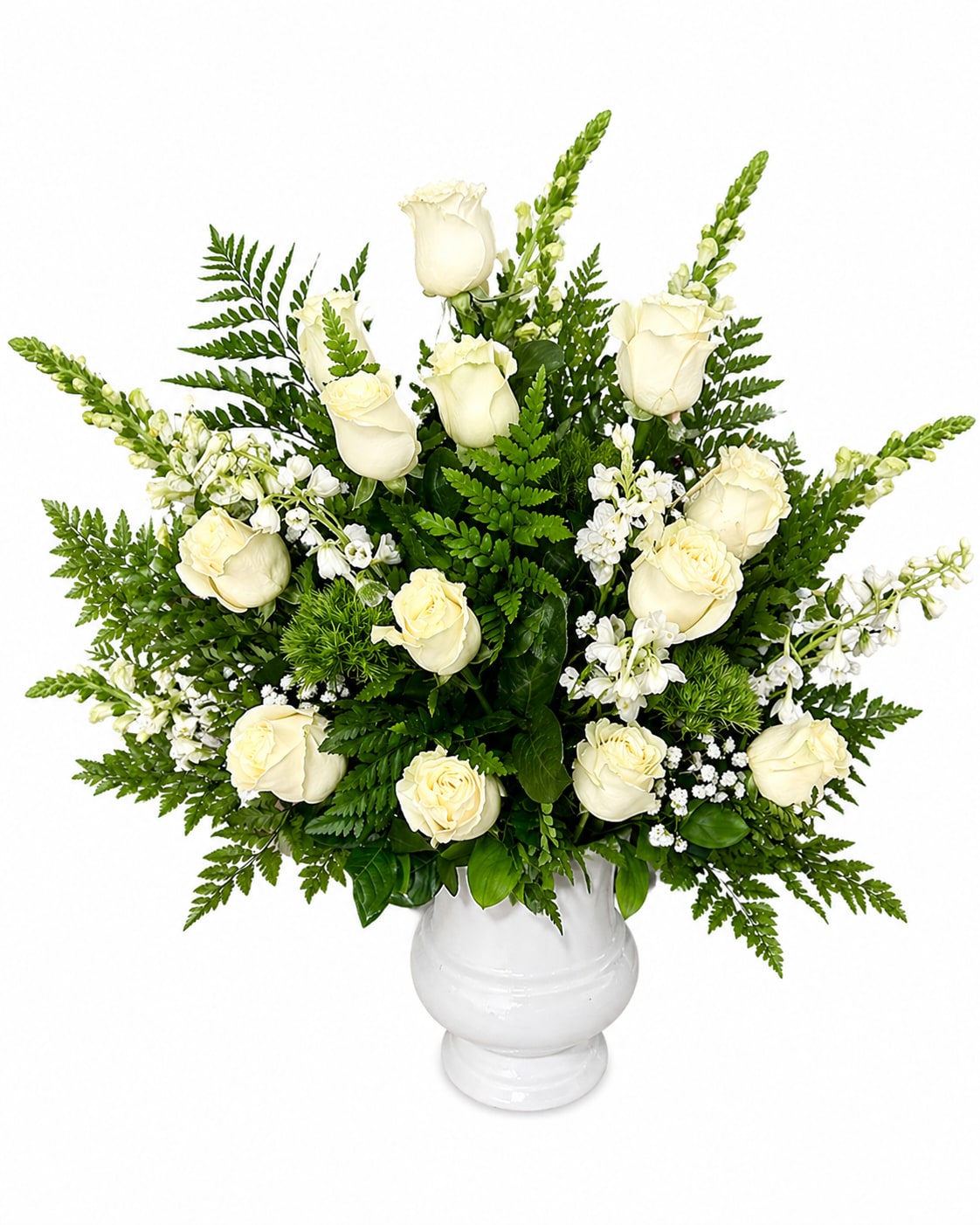 Elegancia Pura - Un arreglo sofisticado y atemporal que transmite paz,elegancia y pureza. Este diseño presenta hermosas roas blancas acompañado de delicados detalles en flores de reseño y follajes frescos creando una composición armónica y refinada.