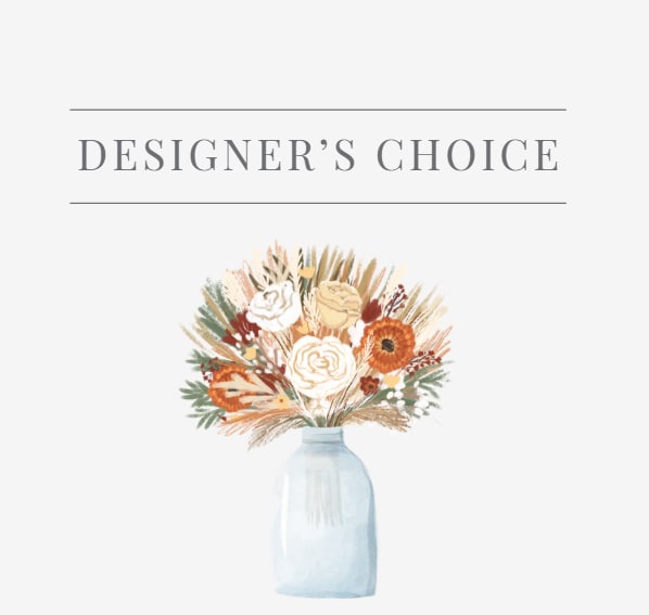 Mixed bouquet of cream and orange flowers in a blue vase