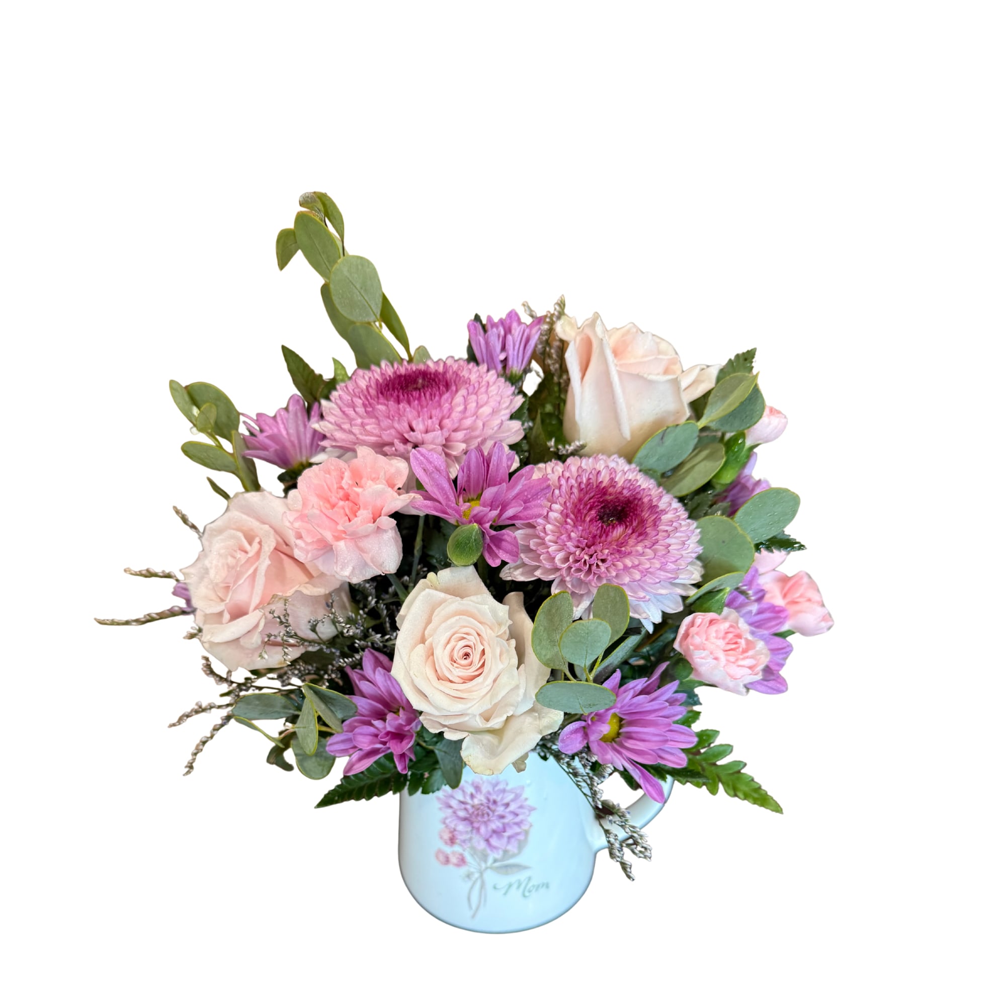 Mom’s Garden  - A soft and heartfelt arrangement designed just for Mom. Mom’s Garden Keepsake is filled with delicate beauty and timeless charm in a keepsake mug adorned with the word “Mom”. 