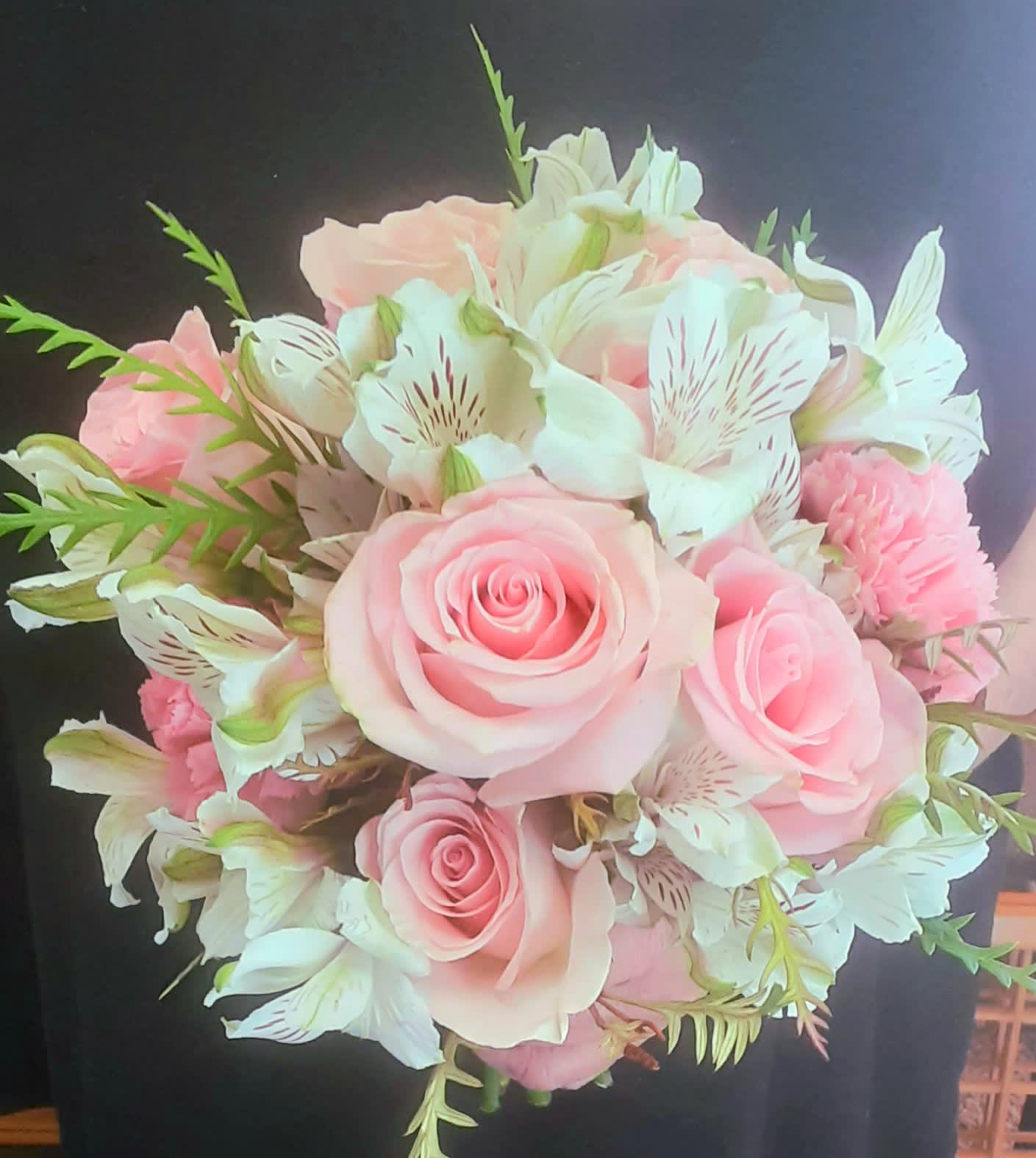 Pink roses and white alstroemeria bouquet with green accents