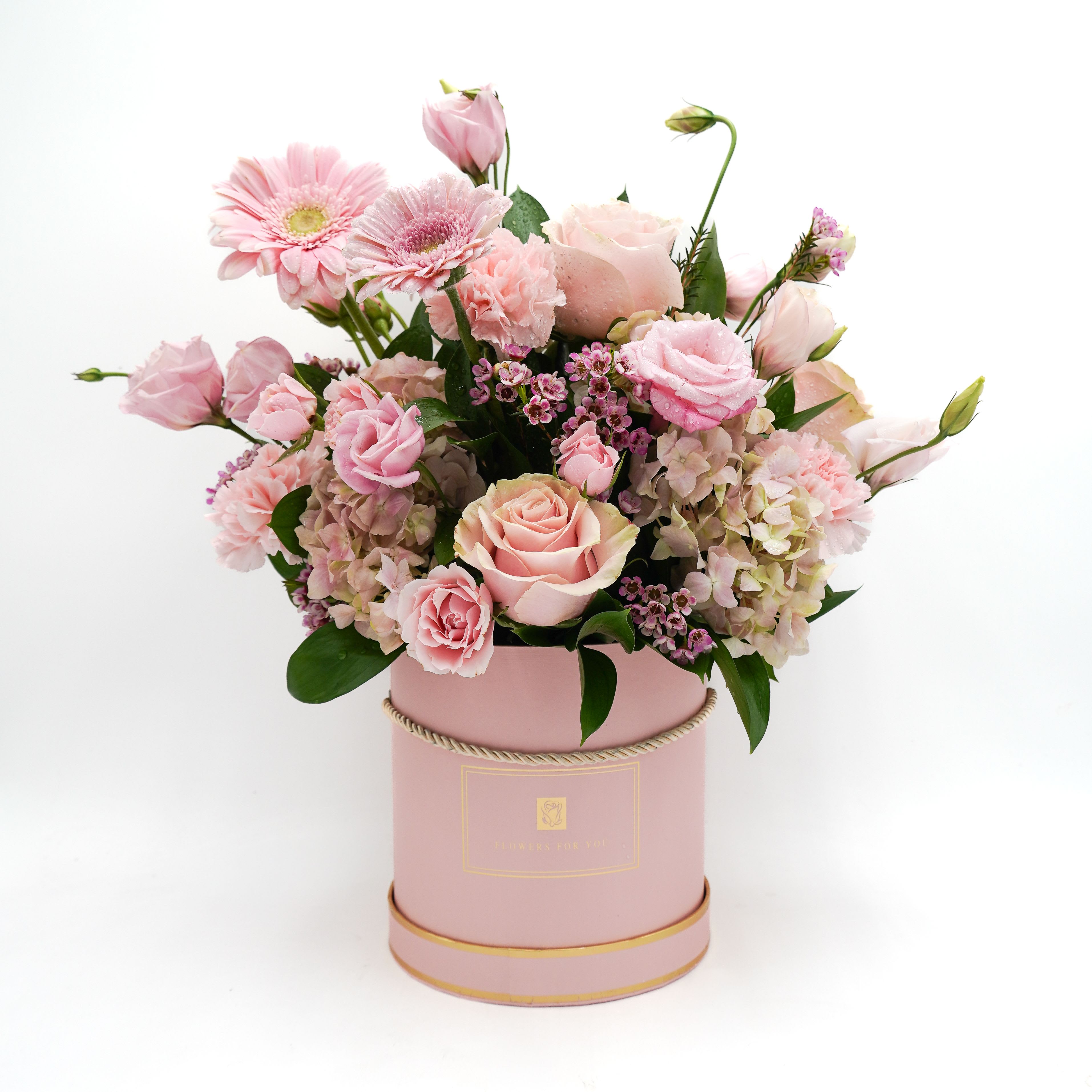 Love You Always Bouquet - A soft and elegant expression of love, this Mother’s Day arrangement features a dreamy blend of blush pink roses, delicate carnations, hydrangeas, and gerbera daisies, beautifully arranged in cylinder pink box. A timeless gift that speaks love, gratitude, and grace—just like Mom.