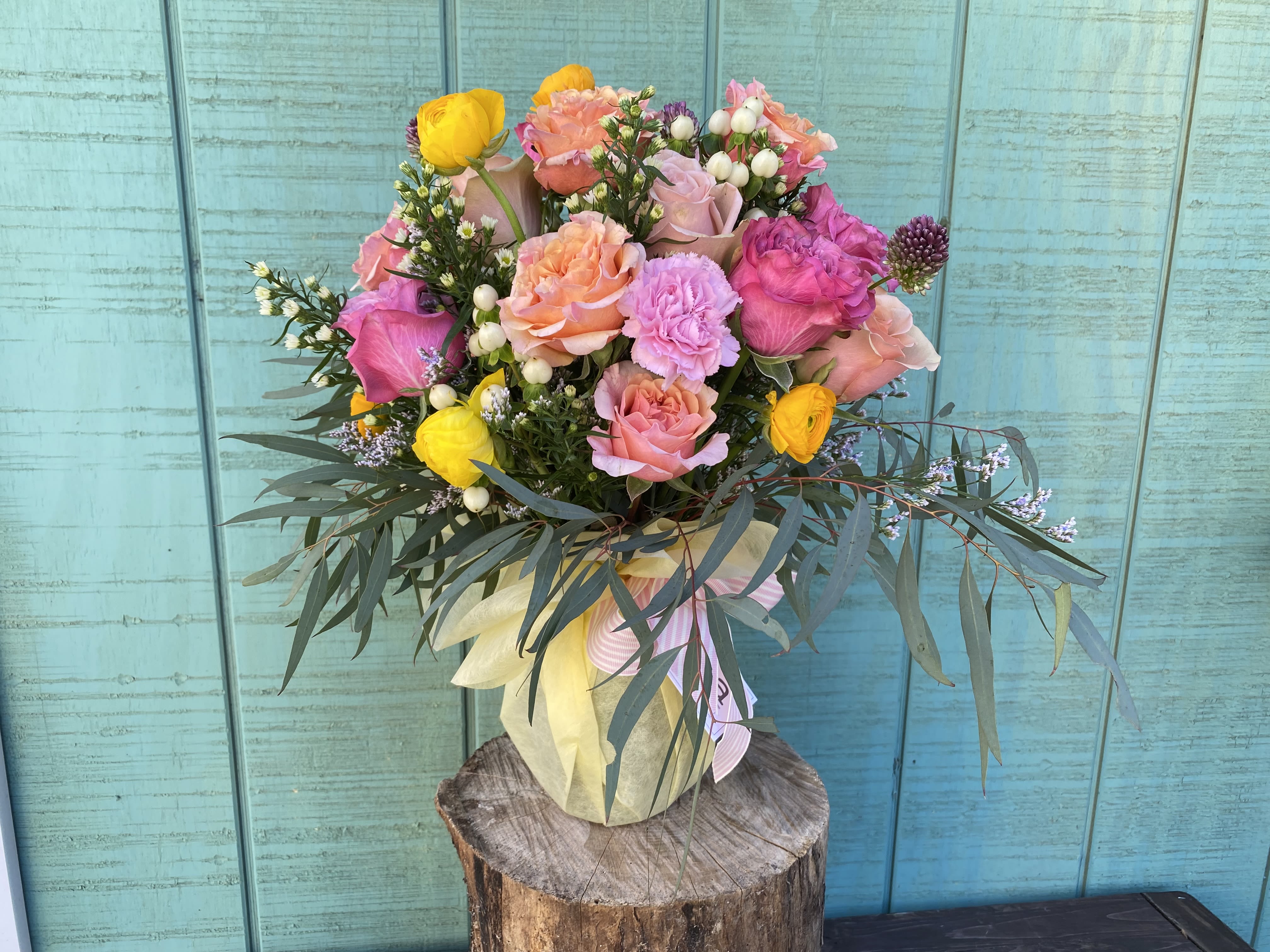 Mother's Day Vase arrangement ( Design of the day)  - The designer will select only the best flowers of the day to create arrangement or bouquet inspired by the seasonal beauty of the flowers.  PLEASE NOTE: The flower selection in the picture is for the design sample and to represent the sizes. The selection of the the flower and color schemes will vary due to seasonal availability.  Please order 48 hours in advance.  