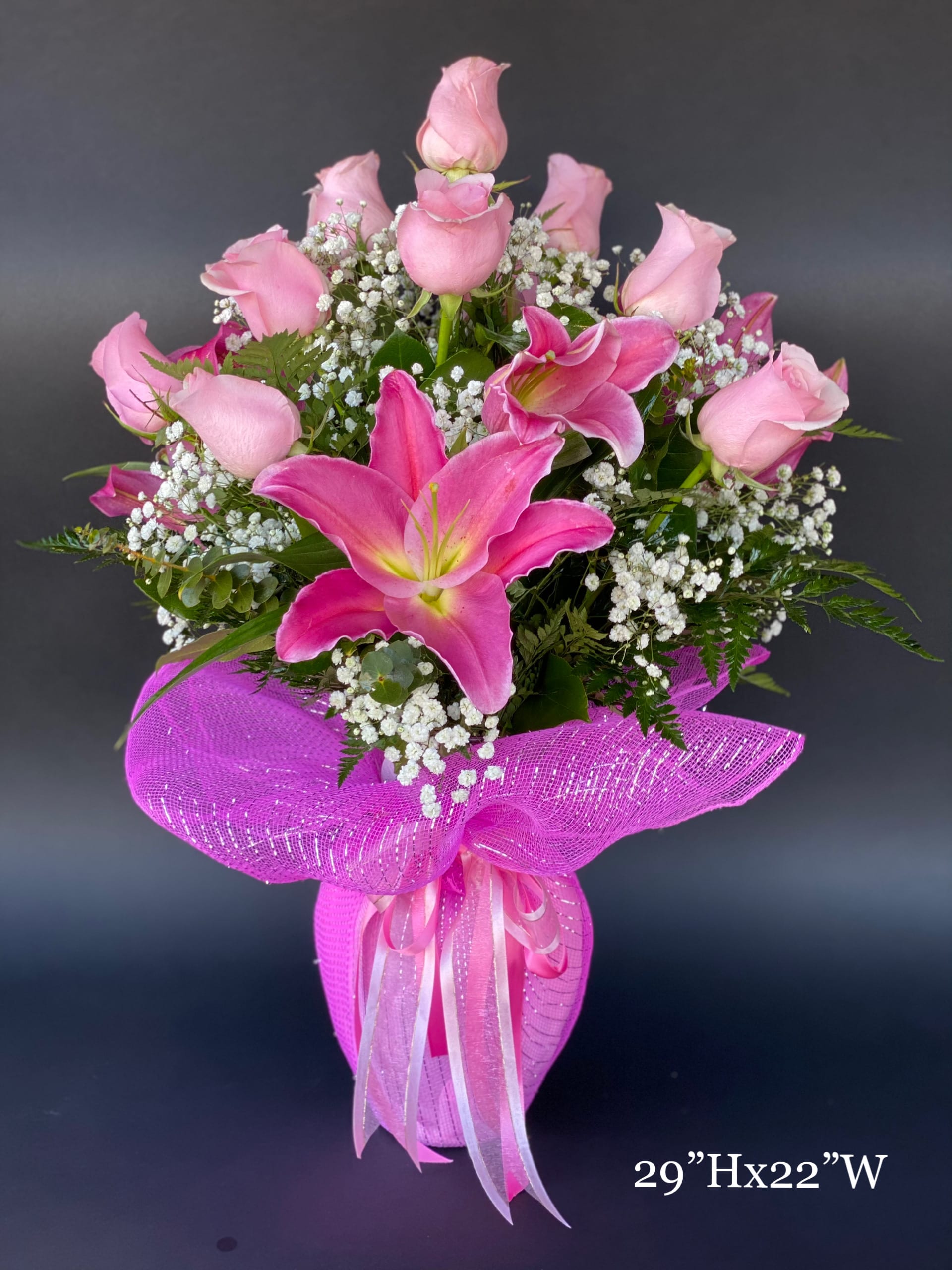 Blooming Roses With Love In Pink - Send the most extravagant 1 dozen Pink rose arrangement. This luxury arrangement makes a big statement of "Blooming Roses With Love". Different Colors roses are available upon request. Additional cost might be required.