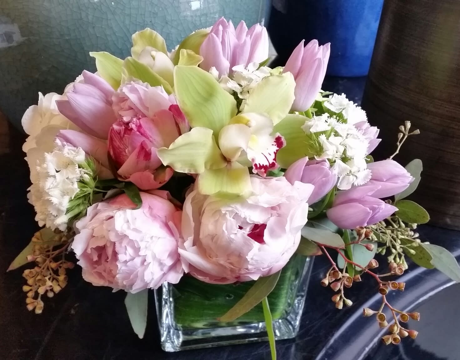 Mother May I  - A sweet arrangement of pink peonies, lavender, green orchids and hydrangea