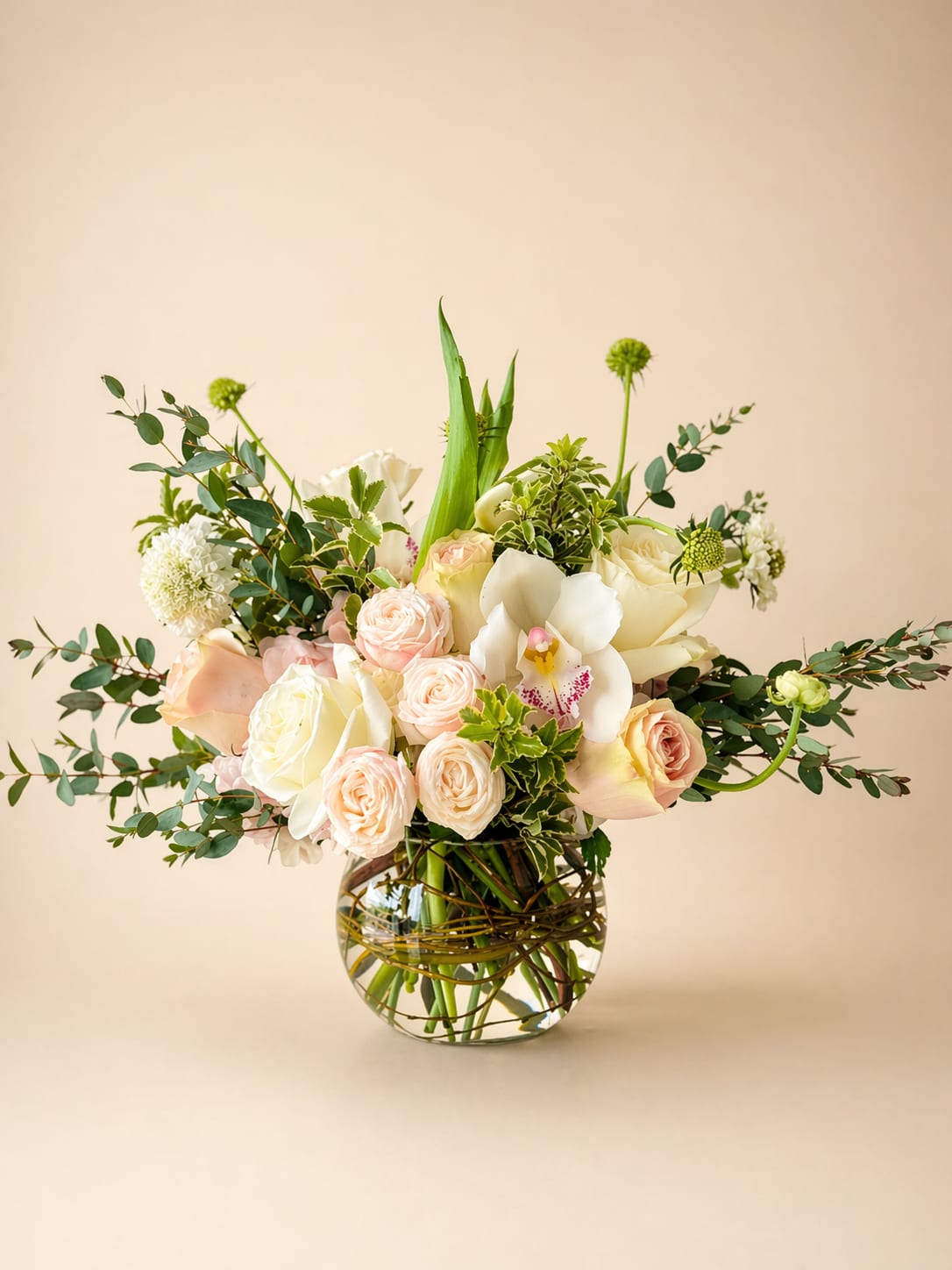 Sweetie - Beautiful and sweet all round flower arrangement. Blushes and whites mix blooms. Built 4” fishbowl. 