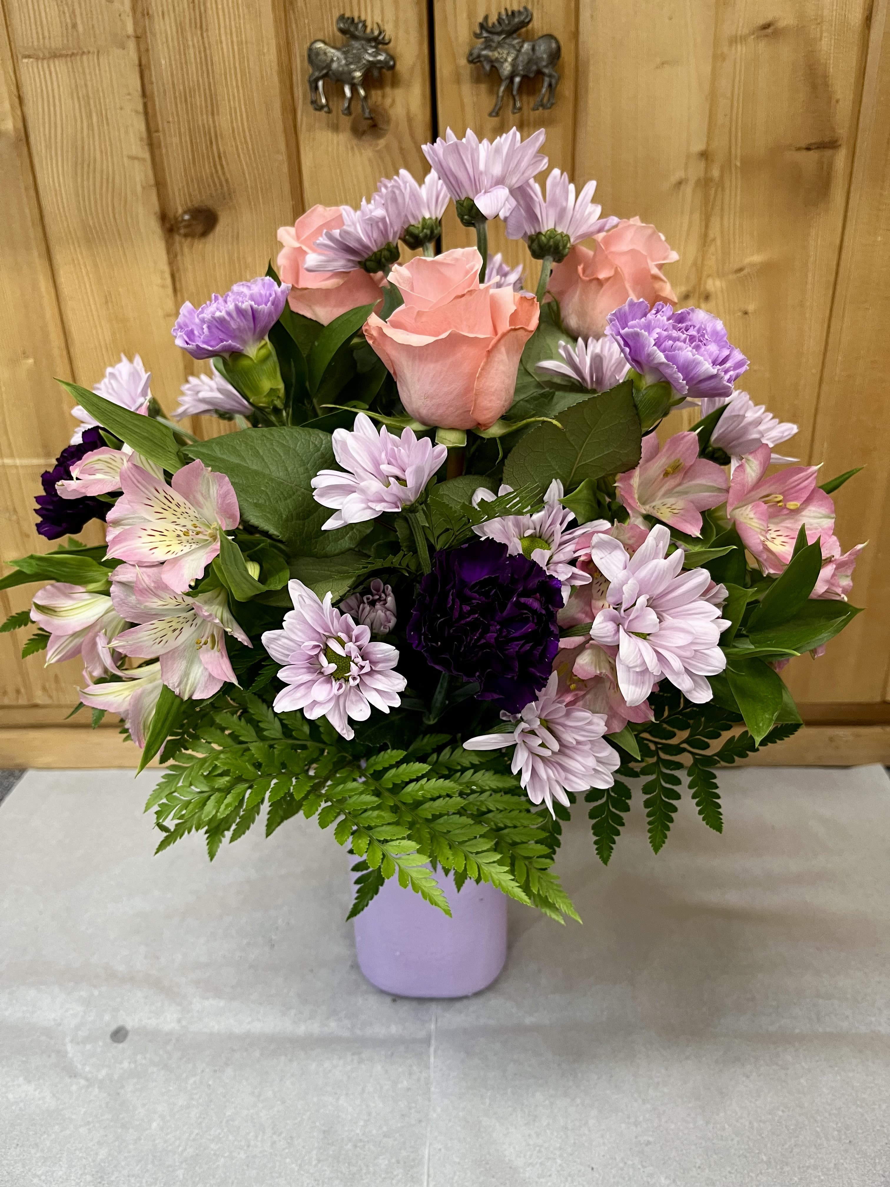 Beautiful As You - Show your love for that someone special in your life by getting them the Beautiful As You bouquet! Soft pink roses and lavender daisies mingle with purple and lavender carnations and pink alstroemeria in a lavender vase. This rounded arrangement feels effortlessly romantic and bright. It is perfect as a birthday bouquet, Mother's Day surprise, anniversary flowers, or a thoughtful just-because gift. The pastel pink and lilac palette reads gentle and cheerful, the kind of mixed bouquet that will make the person you're thinking of feel seen and celebrated.