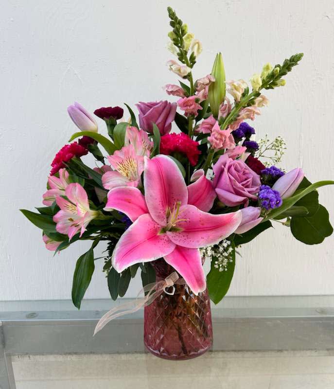 My Mothers Love -  All of Moms favorite flowers. Lilies, roses, tulips, snap dragons, etc.