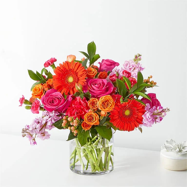 Colorful Fiesta Bouqet - The Fiesta Bouquet is composed of a lively mix, fit to celebrate any and every moment. With a combination of vibrant flowers, this florist–designed arrangement brings a pop of color and a burst of excitement as soon as it arrives.