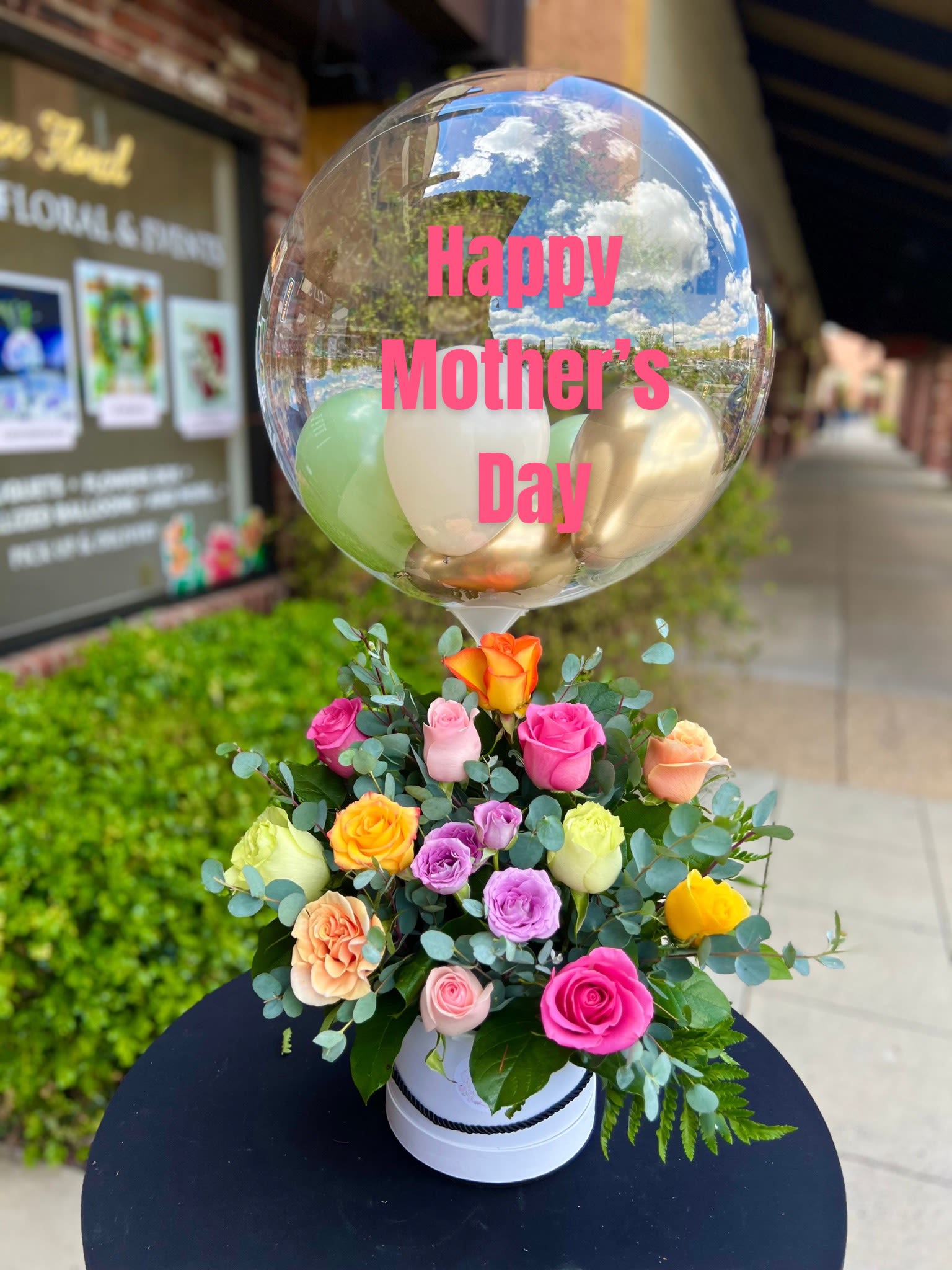 Mixed roses in a white box with a clear Mother's Day balloon