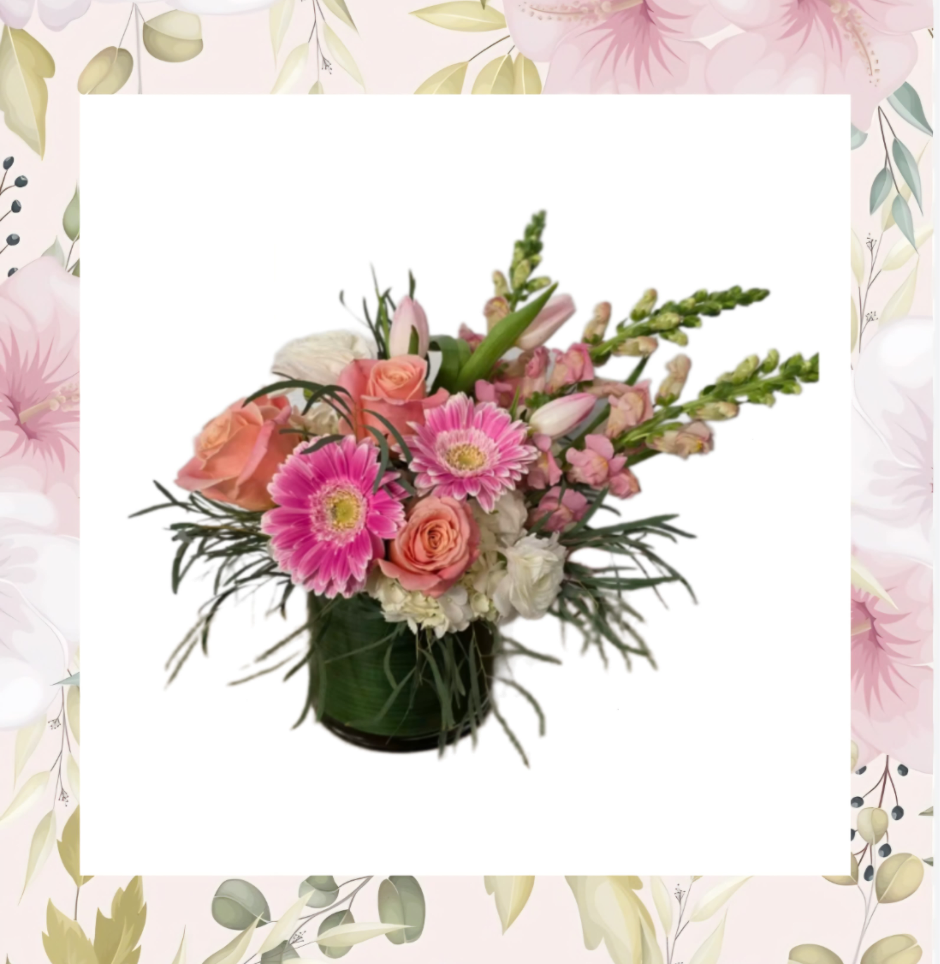 Pink and peach mixed bouquet in a dark green vase