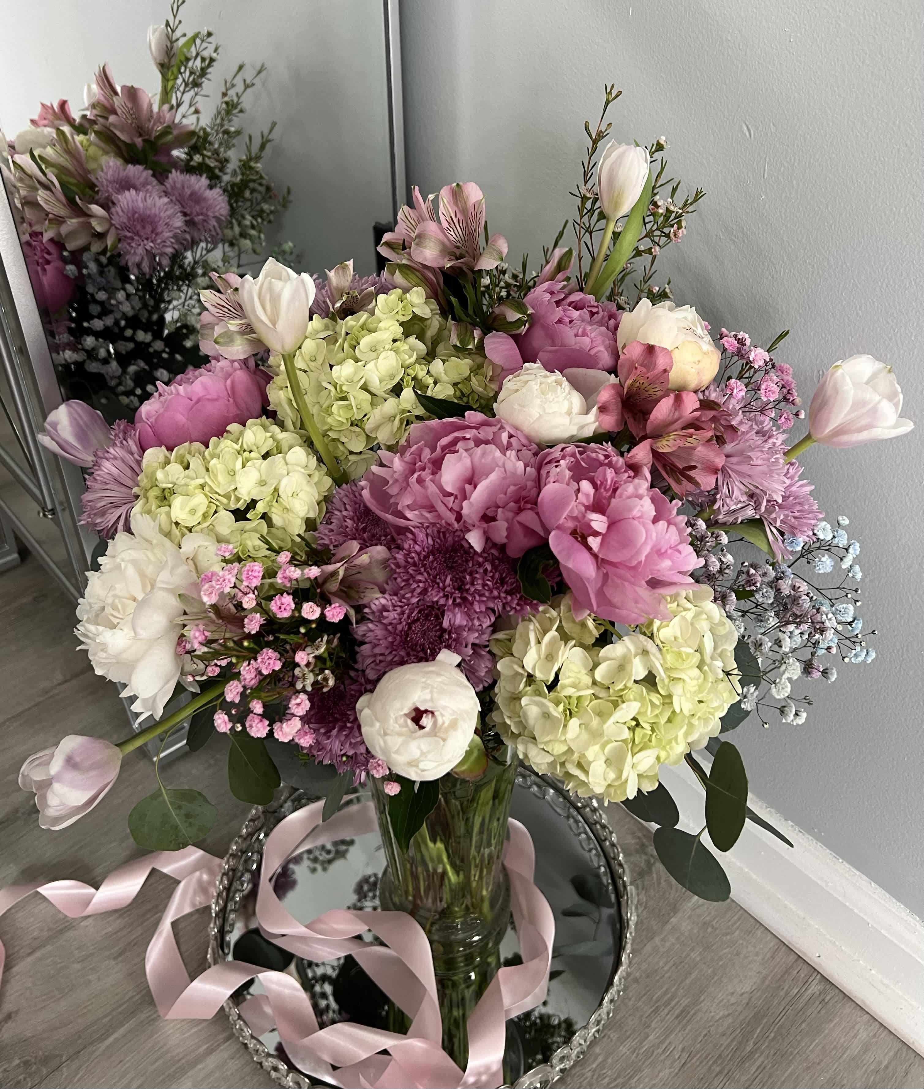 Love You, Mom! - Experience the breathtaking beauty of this grand and elegant arrangement, featuring a harmonious blend of peonies, roses, hydrangeas, and other delightful seasonal blooms.  This bouquet is perfect for: - Celebrations, Mother’s Day, Birthdays and romantic occasions - Elegant home décor - Gift-giving to loved ones.