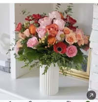 Man on the run - Combination of different colors of flowers in a gold vase