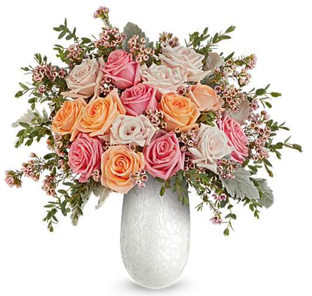 Opal Garden Bouquet - Our Opal Garden Bouquet is a beautiful Mother's Day floral arrangement featuring light pink, peach, and pink roses, accented with pink waxflower, dusty miller, and parvifolia eucalyptus, delivered in our Amelia Vase. Orientation: All-Around  SUBSTITUTION POLICY – Always deliver the freshest flowers! Please note the bouquet pictured reflects our original design.  If the exact flowers or container in this arrangement are not available, our local florists will create a beautiful bouquet with the freshest available flowers.