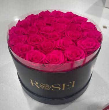 luxury Rose Box -  Pet Friendly? YES While roses themselves are non-toxic to cats and dogs, their thorns can cause physical injury if chewed. Additionally, floral foam or preservatives used in the box should not be ingested by household pets. Keep out of reach; avoid homes with curious cats that like to nibble on petals.   Human Allergy Note No major allergy-triggering flowers noted. As a precaution, keep the arrangement in a well-ventilated area to enjoy the natural fragrance without irritation.   Care &amp; Longevity To keep your flowers Nashville fresh, check the water level daily by feeling the floral foam inside the box. Add a small amount of water to the center of the arrangement to keep the foam hydrated, but avoid over-saturating. Keep the box in a cool spot away from direct sun, heat, or drafty vents. As individual blooms fade, gently remove them to maintain the look of the dome.    Best Occasions &amp; Situations  Romance/Anniversary  Birthday  Mother's Day  Congratulations Flower  Just Because  Wedding's  Women's Day  Thinking of You  Why Customers Love It Modern aesthetic that fits perfectly on a vanity or coffee table. Gift-ready presentation with no need for the recipient to find a vase. Vibrant color balance that stands out in any room. Compact and sturdy design that is easy to transport.