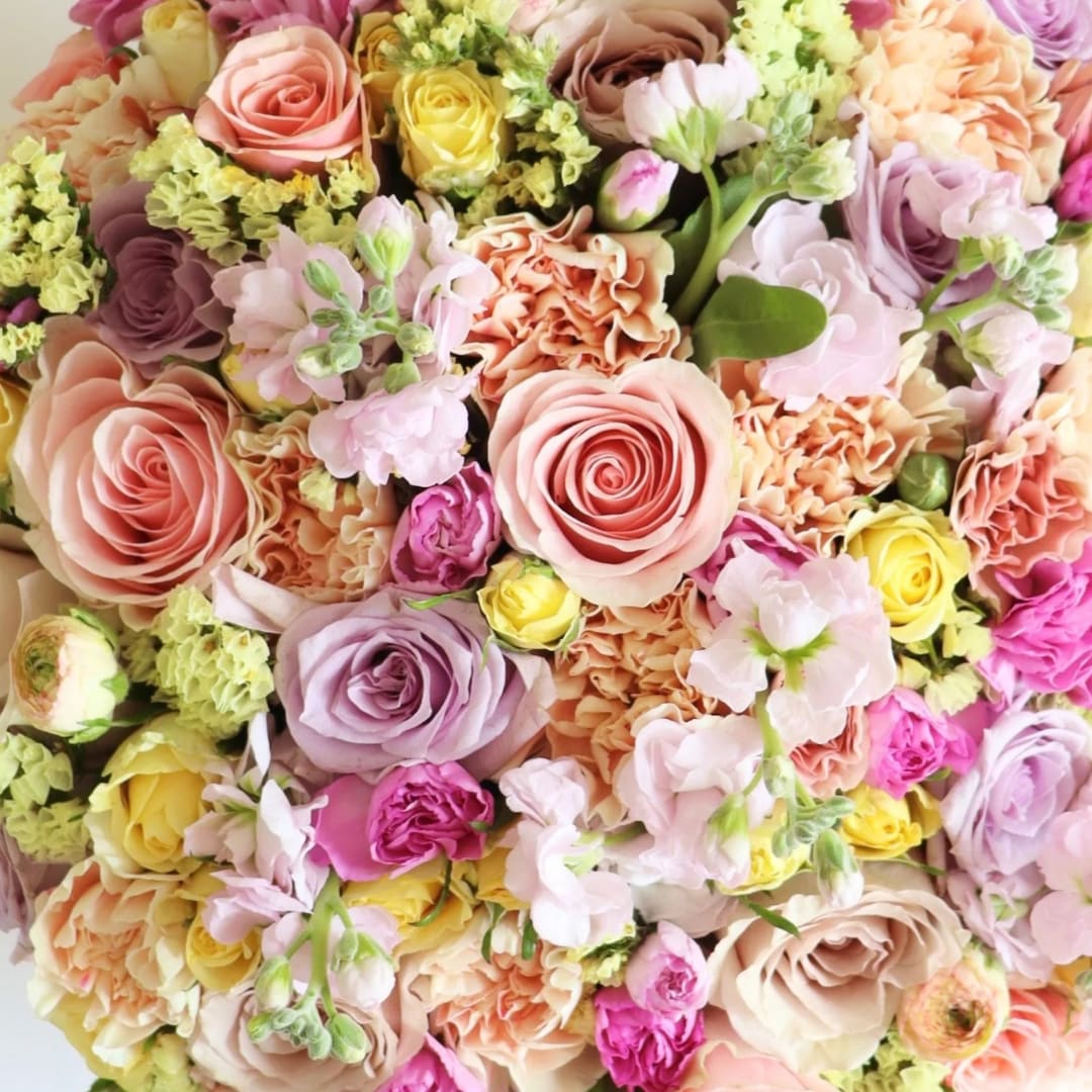 Pastel Designer's Choice  (image for color reference only Actual flowers chosen by designer) - Customized Bouquets by our Expert Floral Designers  Allow one of our Top designers to customize your bouquet from or freshest &amp; premium collection of our inventory  You may Browse our floral collection on or website for inspiration &amp; leave a note for the designer to let us know what style, color or special occasion your celebrating!  We will fill your Flower bouquet to the value of your budget that you choose, with as many fresh flowers we can to make your bouquet as stunning as possible ! all of our custom bouquets are created according to your occasion Birthday Flowers, Get well flowers, Sympathy Flowers, Anniversary Flowers, Wedding Flowers, Congrats Flowers,  We offer Same day Delivery.  Please Note: This item is not created in a vase you have the option in your cart to add a vase for an additional fee. Thank you for choosing Garden 54 