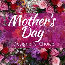 Mother's Day Designers Choice  - Beautiful blooms for Mom.  We will create a lovely arrangement with sensational seasonal flowers that are sure to bring a Smile and a Hug.