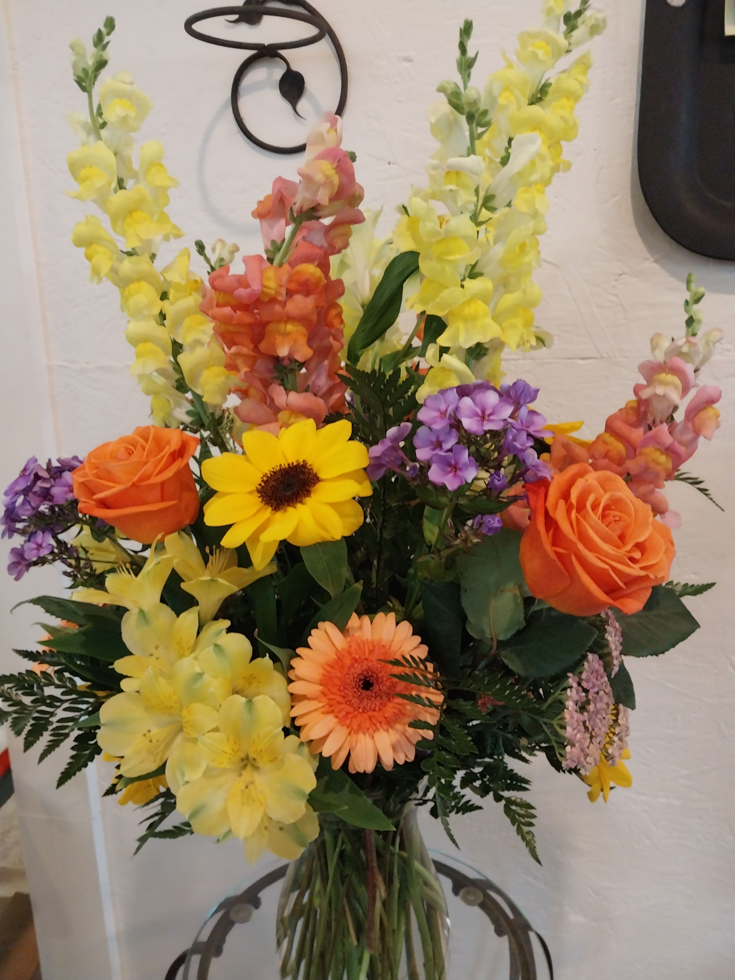 Tropical Sunset  - yellow sunset orange roses Peruvian lilies (alstroemerias) sunflowers snapdragons and lavender phlox 