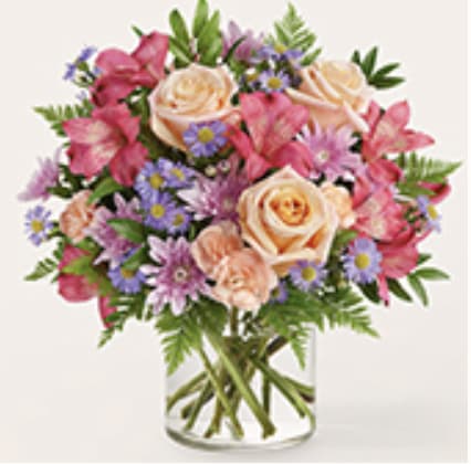 Sunset Serenade bouquet by FTD - Alstroemeria Carnation Chrysanthemum Aster, every $10 increase adds $10.00 worth of flowers. 