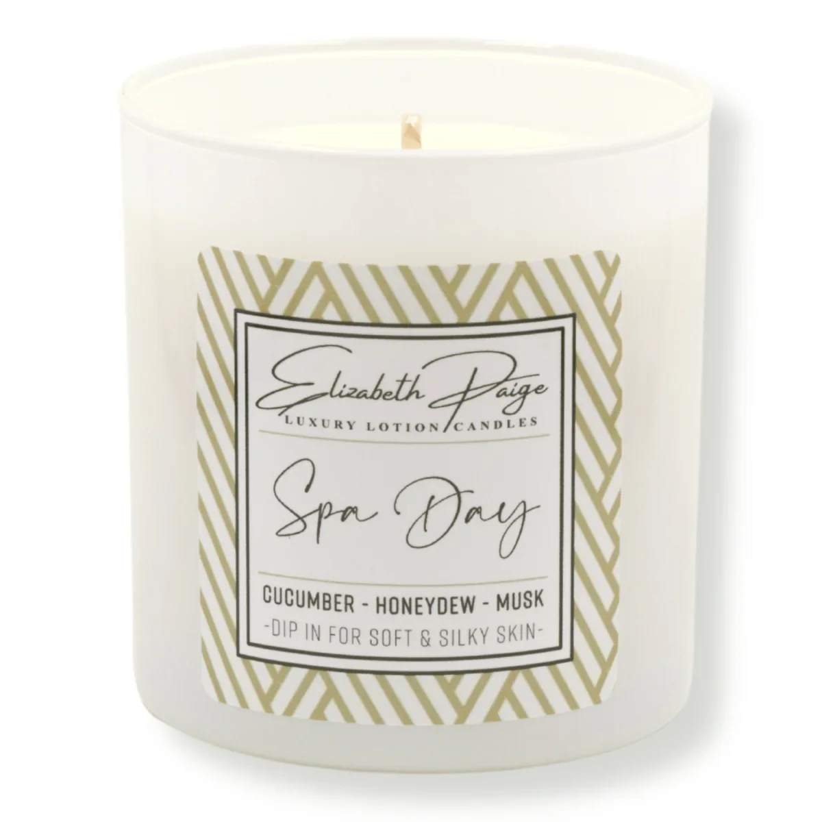 Spa Day Soy Lotion Candle - Cucumber – Honeydew - Musk  Discover your zen with a little help from Spa Day! Top notes of fresh cucumber are sweetened by ripe honeydew and cantaloupe melons. Musk and bamboo base notes enhance the green, natural quality of this refreshing scent.   9oz | Approx 40 hr burn time  100% Pure Soy Bean Oil   Enjoy your favorite fragrance and beautiful ambiance WITHOUT black soot and smoke (just keep those wicks trimmed!)  Made without dyes, additives, petroleum, or paraffin AND hand-poured with love in the USA.  But the fun doesn't stop there! The best (and most unique) part is ... our candles DOUBLE AS LOTION.