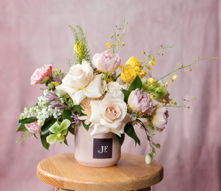 Kendall Pot - Our new Kendall Pot is a fav!   Flowers are a pastel spring mix and designers choice! 