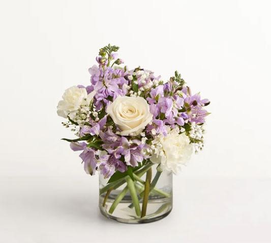 Lovely Lavender Medley  -  Pet Friendly? Use Caution  Exact blooms unknown; keep out of reach of curious cats and dogs to avoid accidental ingestion   Human Allergy Note No major allergy-triggering flowers noted. Keep away from bedding for sensitive individuals.   Care &amp; Longevity Trim stems before placing in fresh water. Keep in a clean vase, change water every 2–3 days, and remove fading blooms promptly. Avoid direct sunlight, heat sources, or vents.    Best Occasions &amp; Situations  Get well comfort  Thinking of you  Just because  Retirement flower  New home  Encouragement  Housewarming  Congratulations flower  I’m sorry  Administrative Professionals Week  Why Customers Love It Elegant color balance in soft purples and whites Versatile design suitable for multiple occasions Handcrafted, gift-ready presentation Fresh, premium blooms selected locally