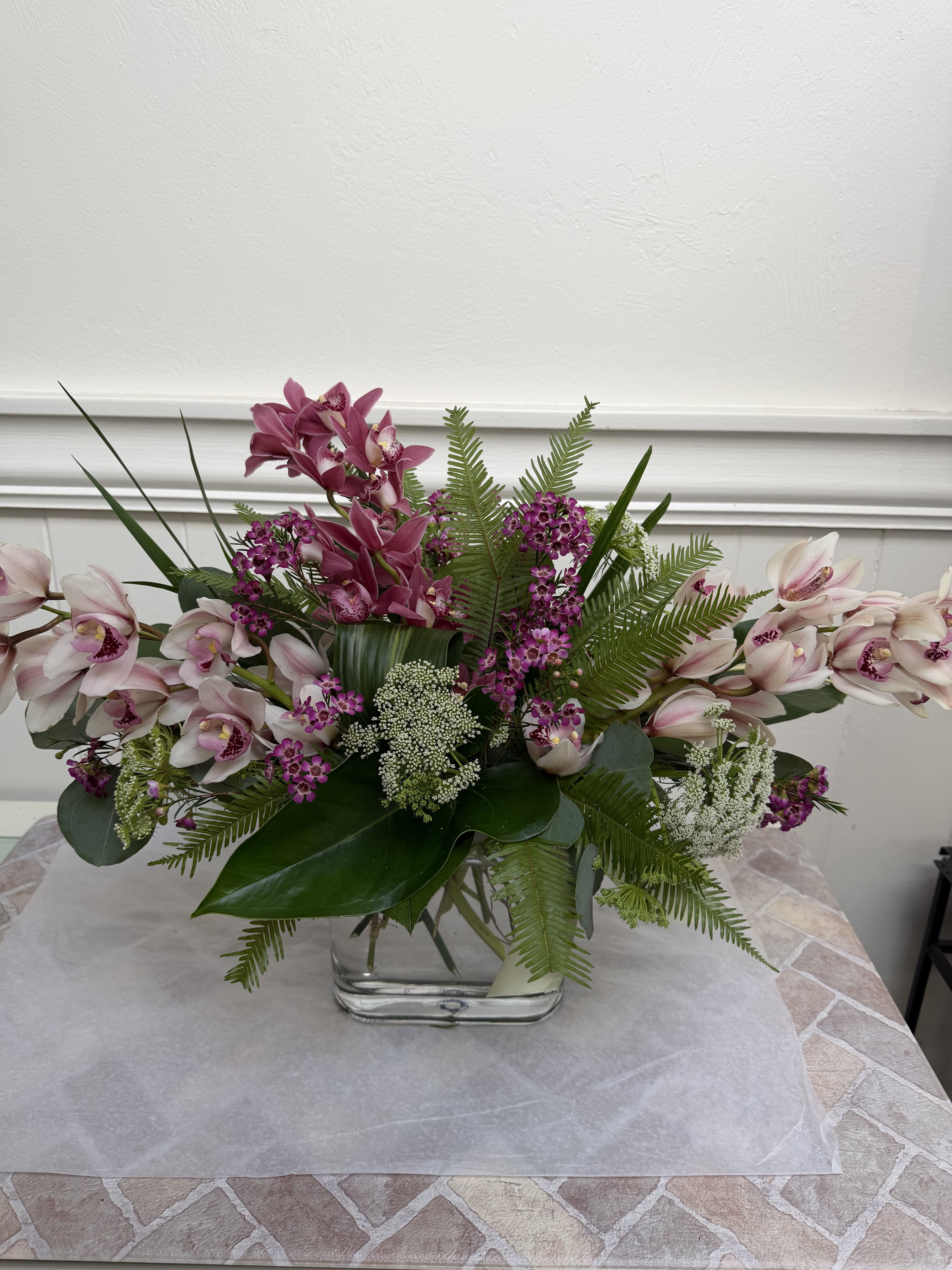 Avant-Garde - Beautiful modern arrangement featuring cymbidium orchids