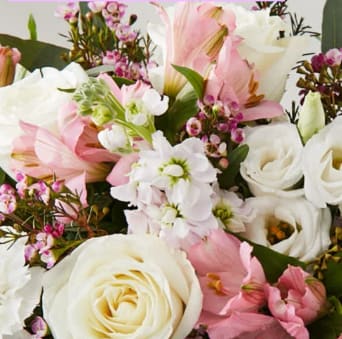Designer's Choice Mother's Day Arrangement - Show your love and gratitude with our beautiful Designer's Choice Mother's Day Bouquet. In three sizes, this beautifully crafted arrangement of select  blooms is the perfect way to celebrate and honor the beauty of motherhood.