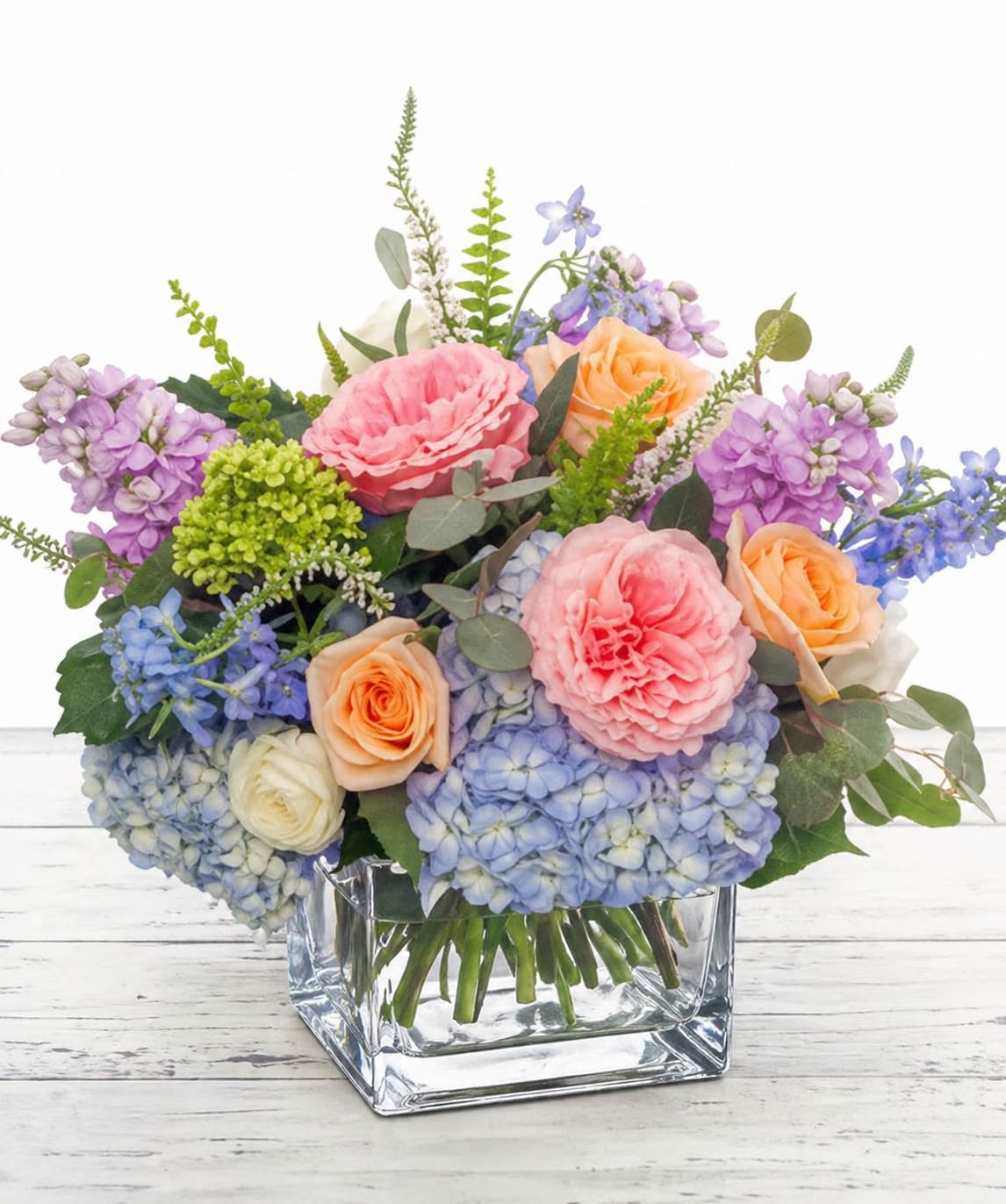 English Garden Bouquet  - Capturing the essence of a picturesque English Cottage garden with its dazzling colors, feeling of abundance, and an unorganized natural style is what the English Garden Style flower arrangement is all about.