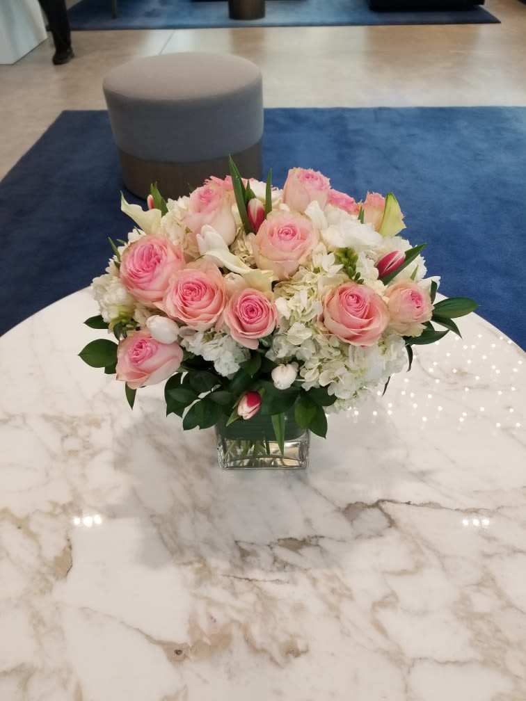 Pretty in Pink - Pastel pink roses with hydrangea and tulips in a vase