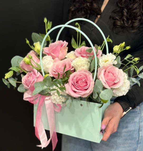 ROSEY - An elegant tote of lush pink rose, lisianthus and springy flowers.