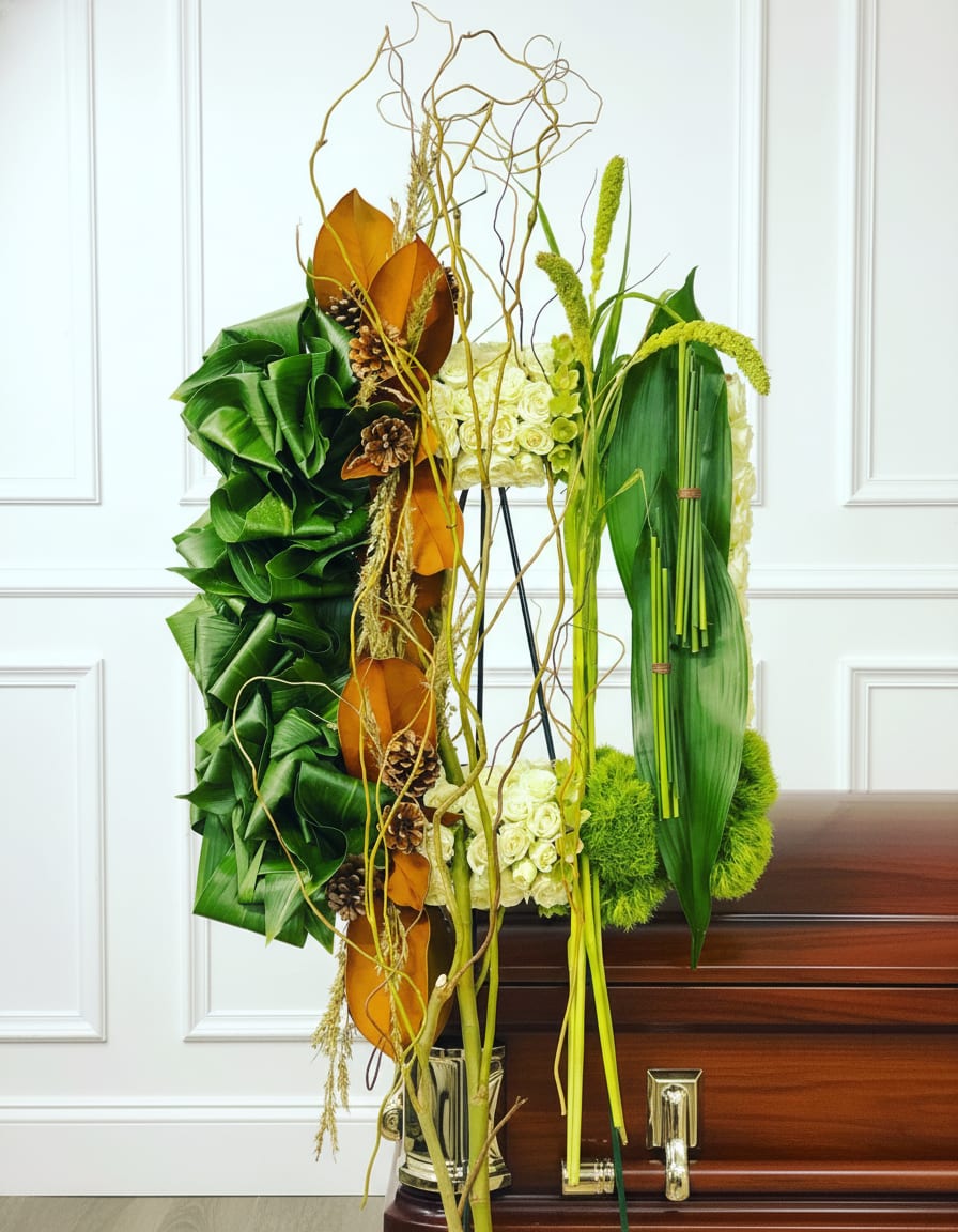 Modern Square Easel - Tall, ceremonial easel arrangement with white roses, green foliage, orange accents and natural branches.