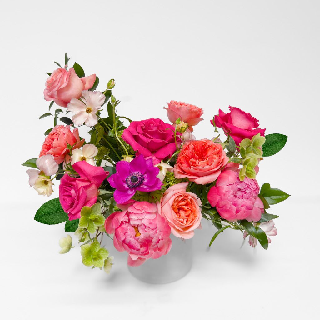 With Love - This pink arrangement is made to order, using the finest and freshest flowers of the season.
