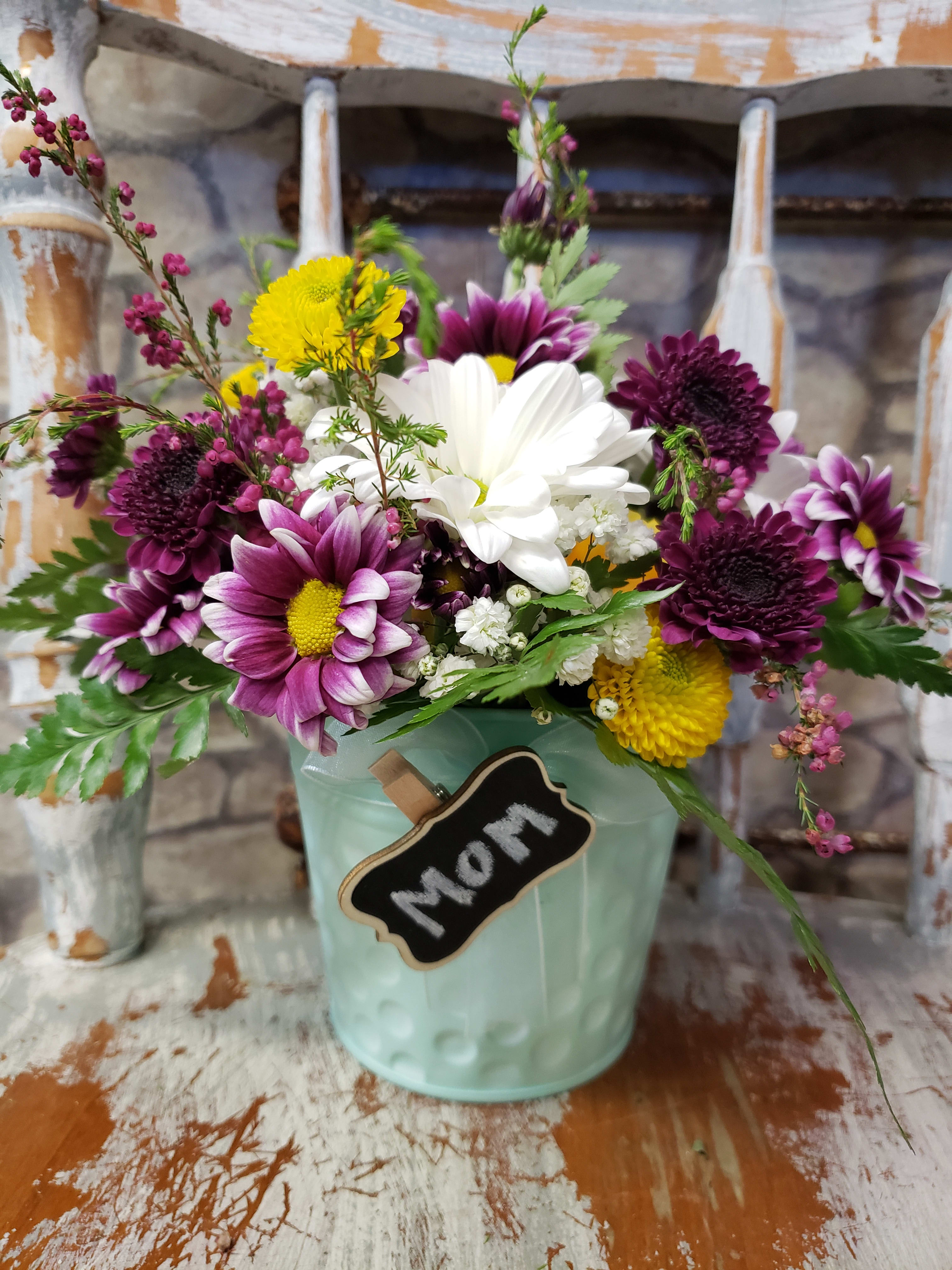 Mom's Petite Design SOLD OUT! - TIN POT IS SOLD OUT! Design/flowers SOLD OUT! This 4" circular design, NOW in a different container.  is a perfect choice. Ideal for the Nursing home or assisted living units. Even has Spray Rose's for Mothers Day or week! Tin colors and flowers will vary...supplies are limited. Random colors available till the 9th of May