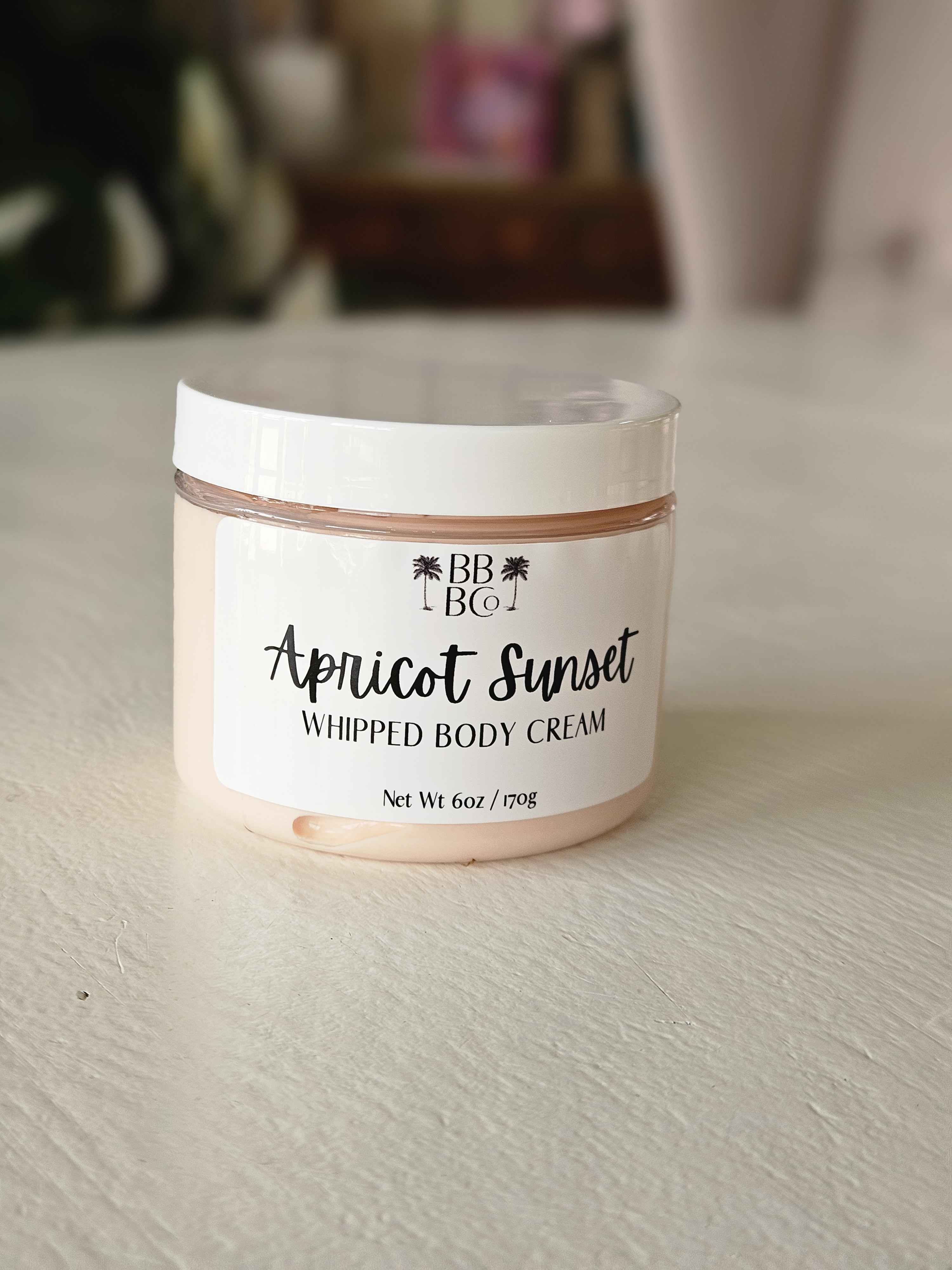 Apricot Sunset Whipped Body Cream - Indulge your skin with our Apricot Sunset Whipped Body Cream, a luxurious moisturizer infused with a delightful blend of fresh apricots, delicate lavender, warm sandalwood, and white musk. This beautiful and complex scent is perfect for any occasion, making it a must-have in your skincare routine. Treat your skin to the moisture it craves with our Apricot Sunset Whipped Body Cream—your new go-to for glowing, healthy skin.
