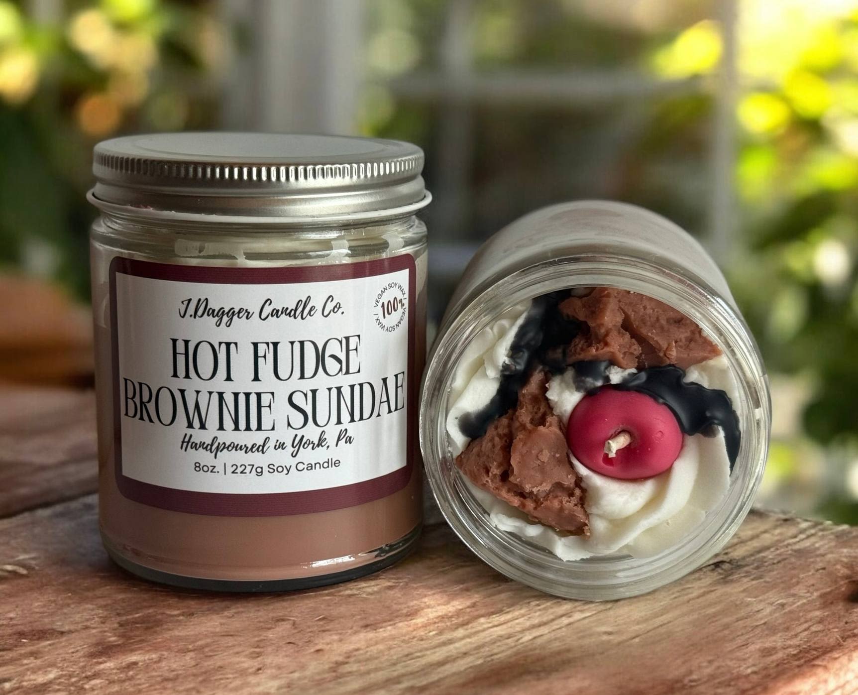 8oz. Hot Fudge Brownie Sundae Dessert Soy Candle - -Made with 100% Soy wax and scented with phthalate free fragrance oils.   Fragrance Notes: Chocolate Fudge, Vanilla, Whipped Cream  -Burn Time: 30 Hours  -Dimensions: 3" tall, 2.75" diameter