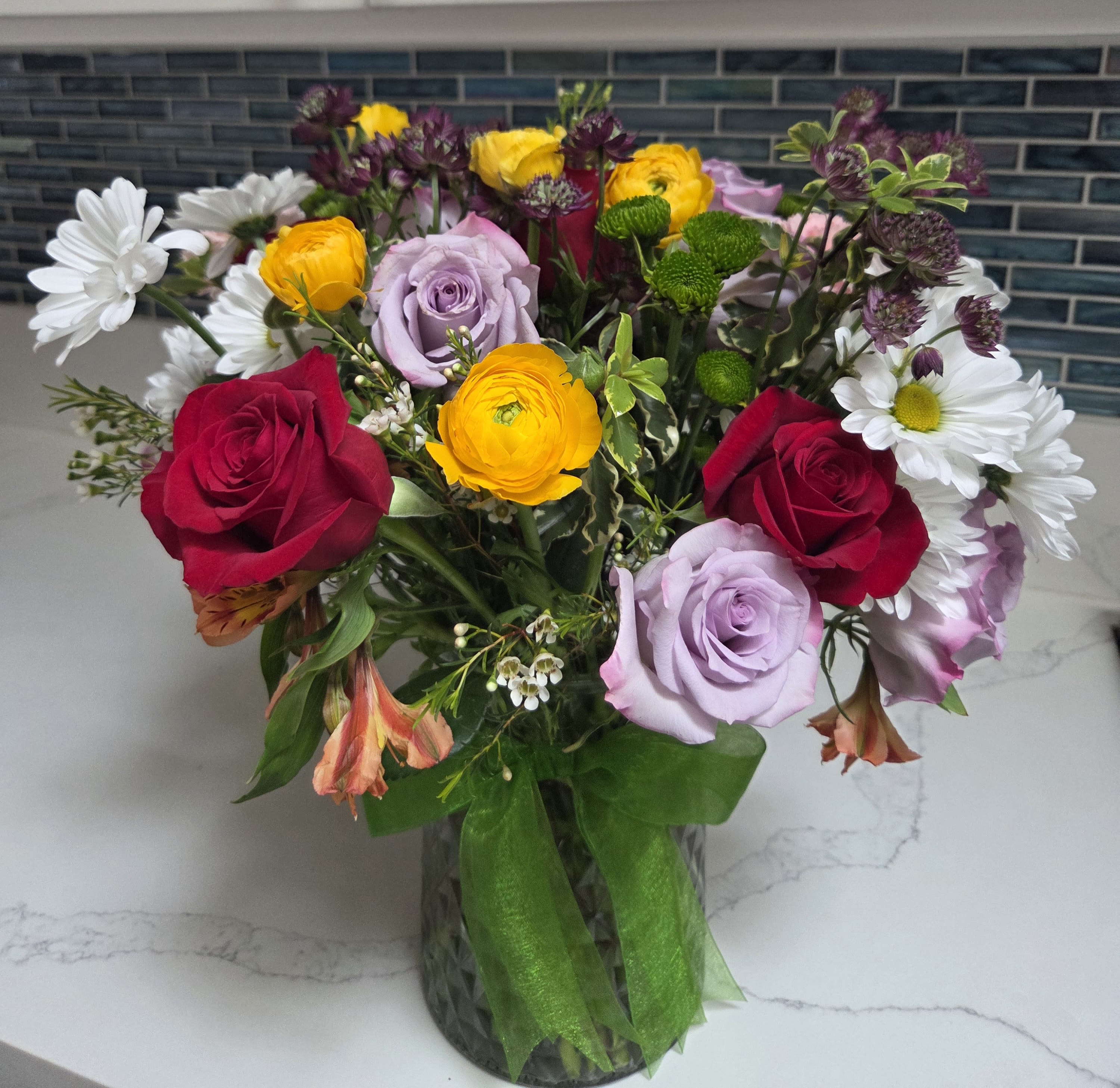 Spice of Life - Add spice (and color) to someone's day /any occasion with this delightful display of color! Displayed in clear glass vase.