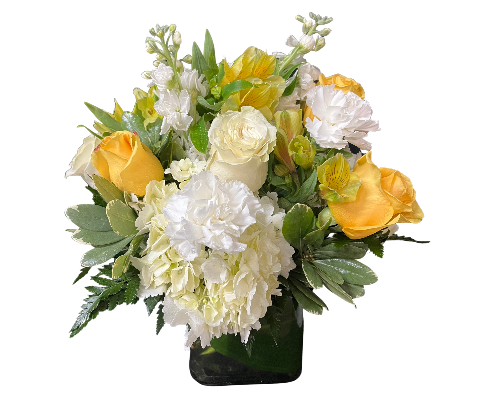 Yellow and white floral arrangement in a glass vase