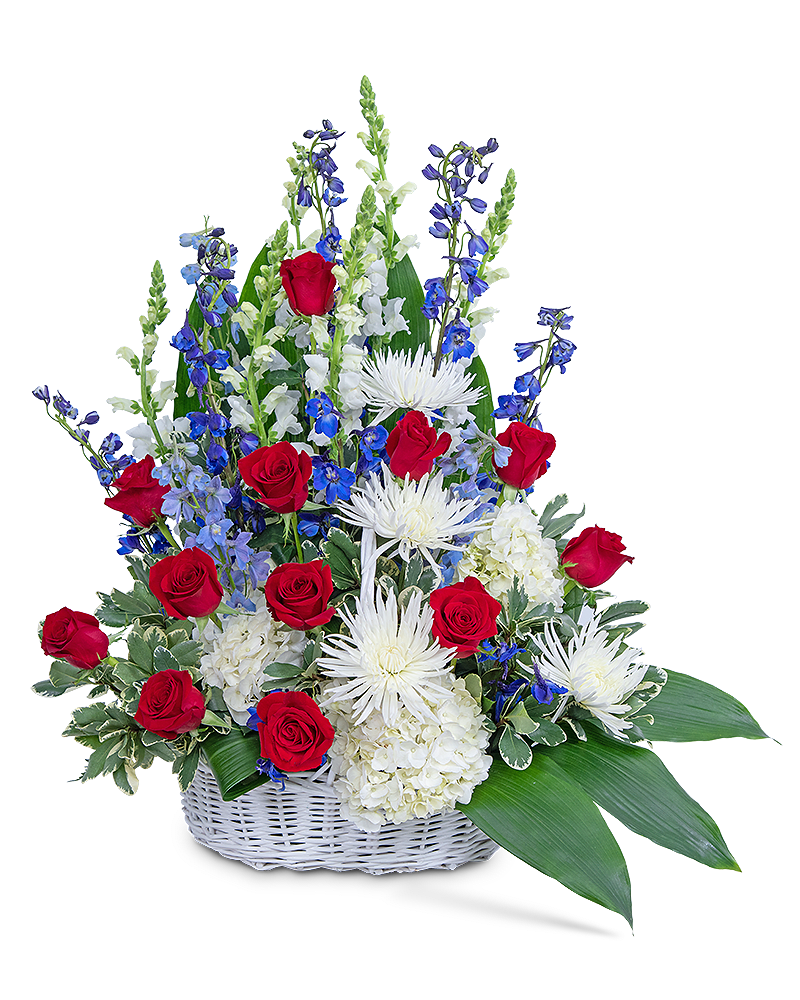 Basket arrangement of red roses, white chrysanthemums, and blue flowers