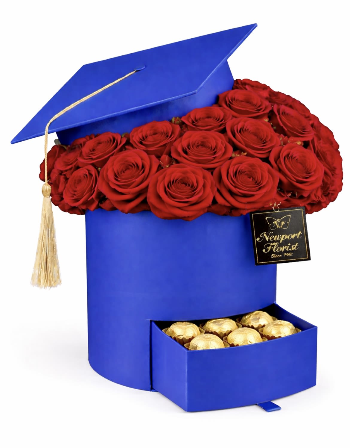 Royal Celebration Honors NF-Y50 - A bold blue graduation cap box crowned with a dense band of red roses makes this flower arrangement an unforgettable graduation gift and a festive way to say "congratulations." The graduation cap motif and included gold tassel announce the achievement the moment it's seen, while the saturated red roses add a romantic, celebratory energy perfect for grads, partners, or a proud parent sending their best.  The arrangement pairs vivid cobalt-blue packaging with richly colored red roses and pops of yellow accents for visual contrast. A matching blue drawer box at the base slides open to reveal gold-wrapped chocolate candies, turning the presentation into both a keepsake and a sweet treat. Finished with a graduation cap box, a decorative drawer, and a branded tag, this piece looks polished on a mantle or reception table and arrives ready to display.  Ideal for high school or college graduations, commencement parties, or congratulatory visits, this keepsake-style floral gift honors the recipient and gives them something to remember the day by. Order with confidence for delivery timed to the celebration; the sturdy box design keeps roses secure in transit and the chocolates tucked neatly in the drawer for an extra surprise.
