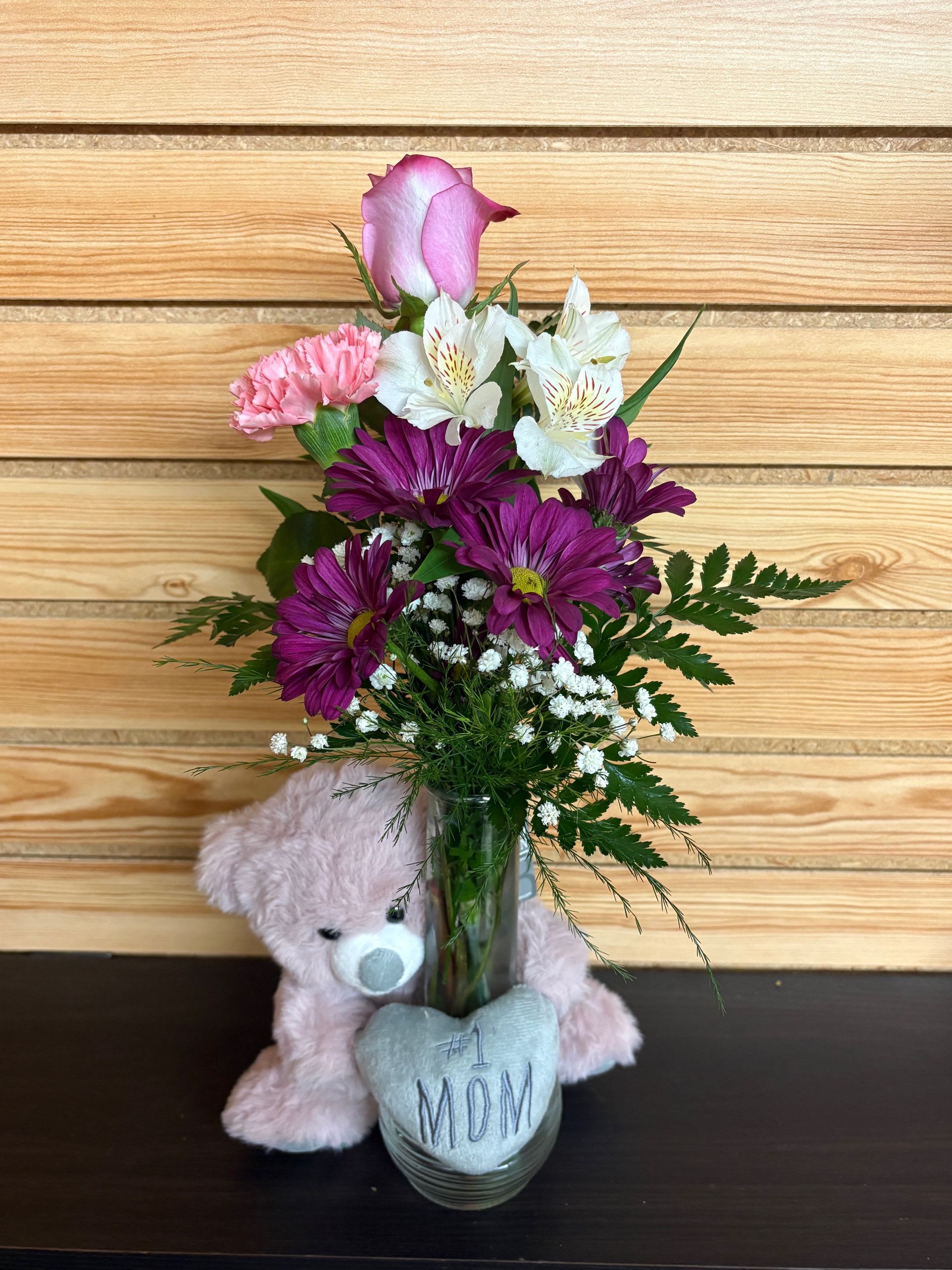 #1 Mom - To show any Mom they're  #1 in your heart! Along with a lovely bear, this arrangement comes with a rose, a carnation, alstroemeria, and daisies!